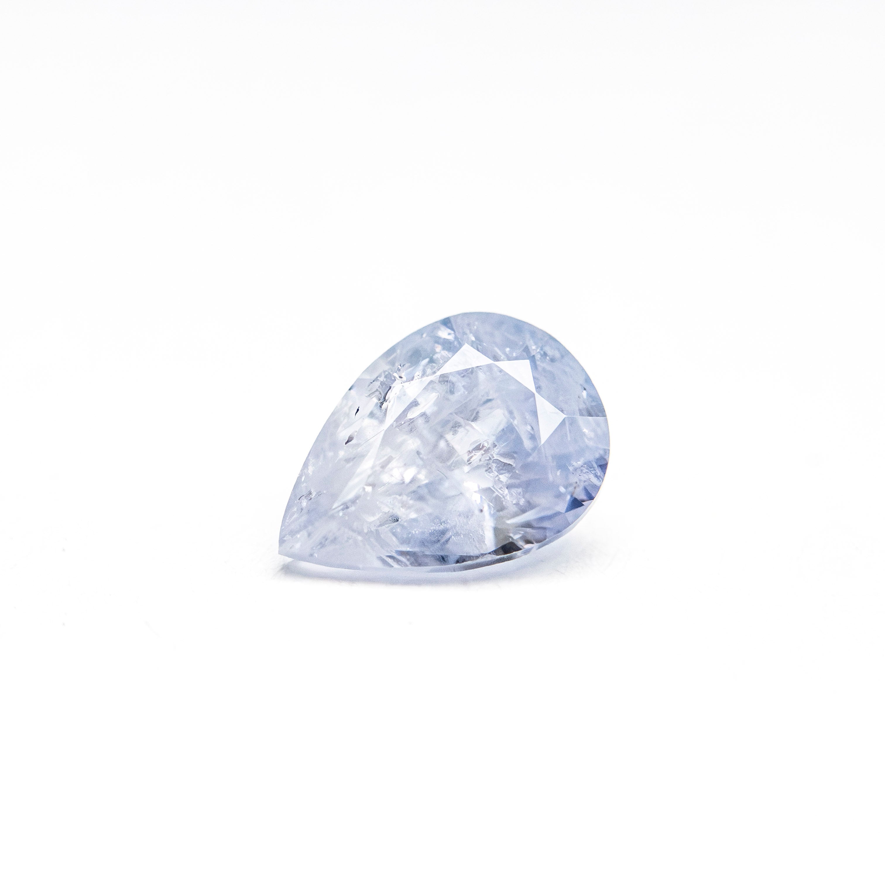 0.80ct 6.84x4.89x3.38mm Pear Brilliant Sapphire 26150-17 - Lelya - bespoke engagement and wedding rings made in Scotland, UK