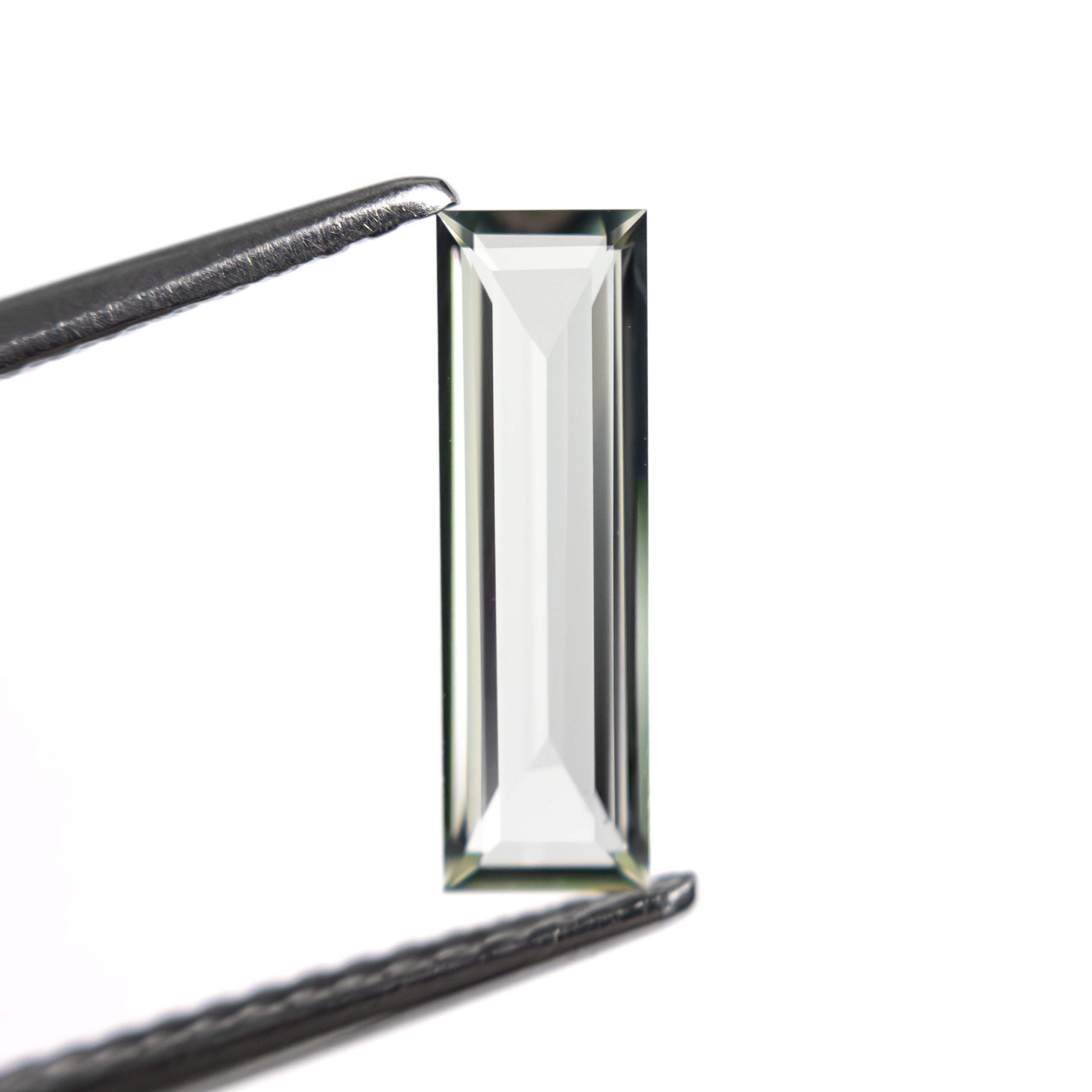 0.81ct 11.41x3.48x1.63mm Baguette Step Cut Sapphire 27720 - 05 - Lelya - bespoke engagement and wedding rings made in Scotland, UK