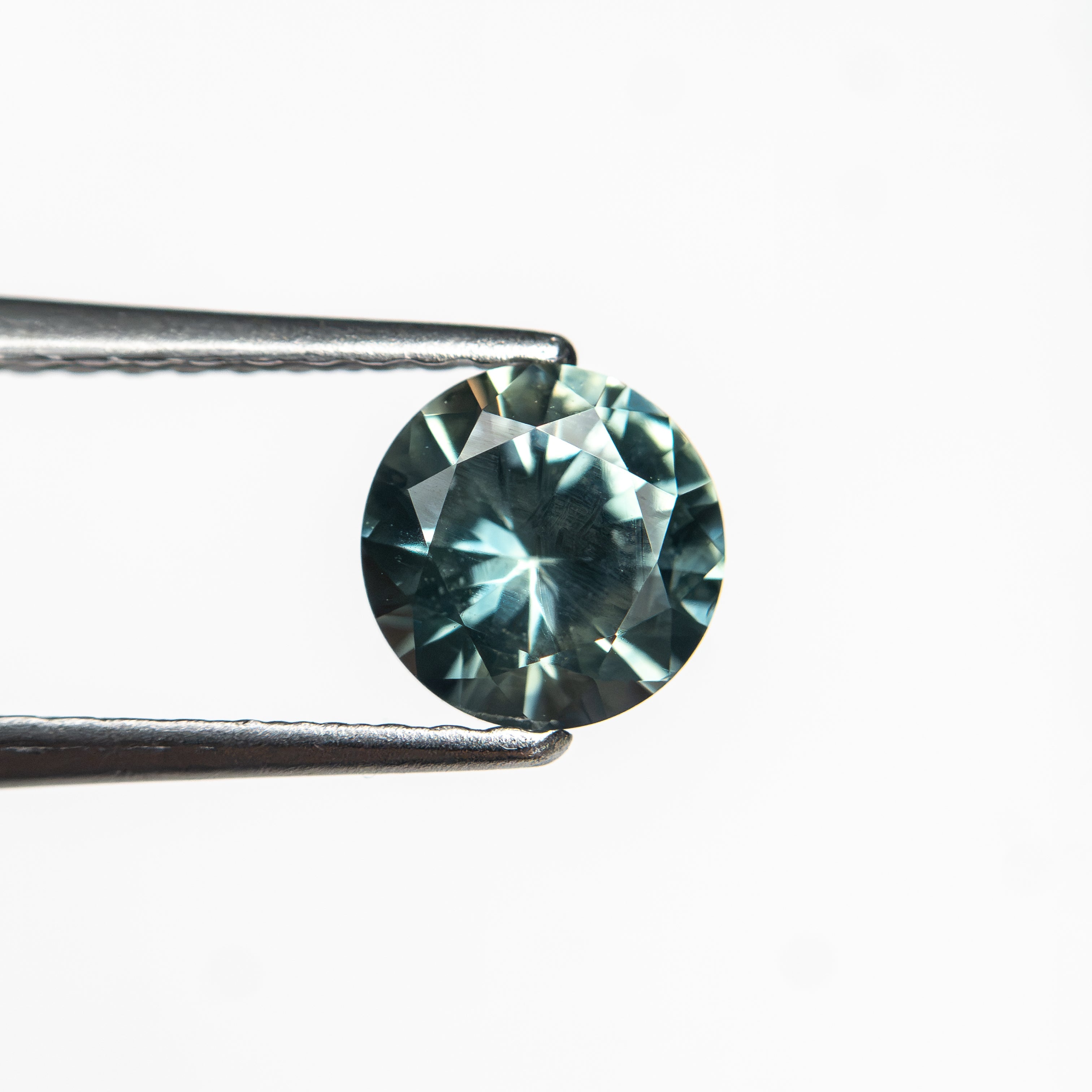 0.81ct 5.54x5.51x3.56mm Round Brilliant Sapphire 26134-24 - Lelya - bespoke engagement and wedding rings made in Scotland, UK