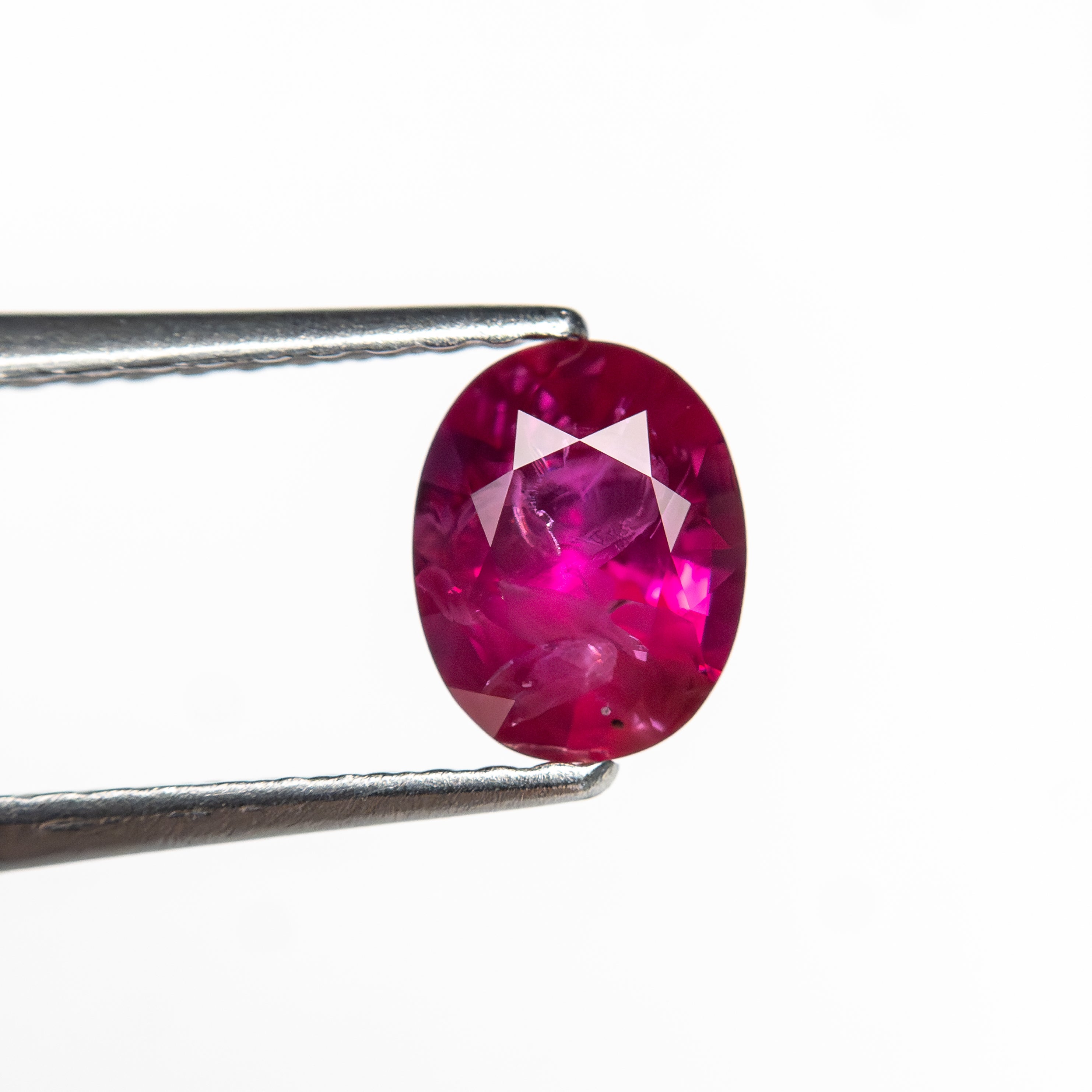 0.82ct 6.31x5.00x3.28mm Oval Brilliant Ruby 27957 - 02 - Lelya - bespoke engagement and wedding rings made in Scotland, UK