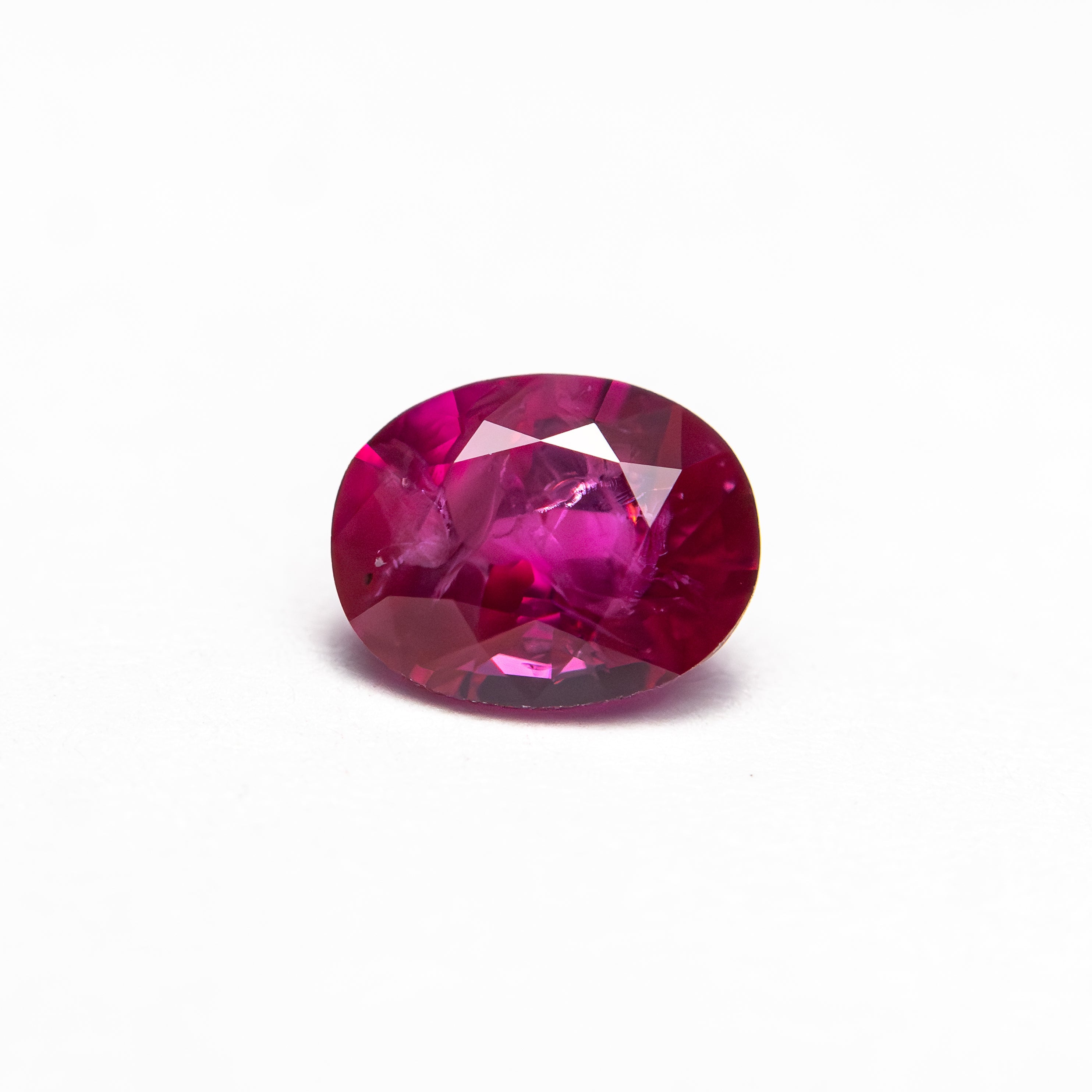 0.82ct 6.31x5.00x3.28mm Oval Brilliant Ruby 27957 - 02 - Lelya - bespoke engagement and wedding rings made in Scotland, UK