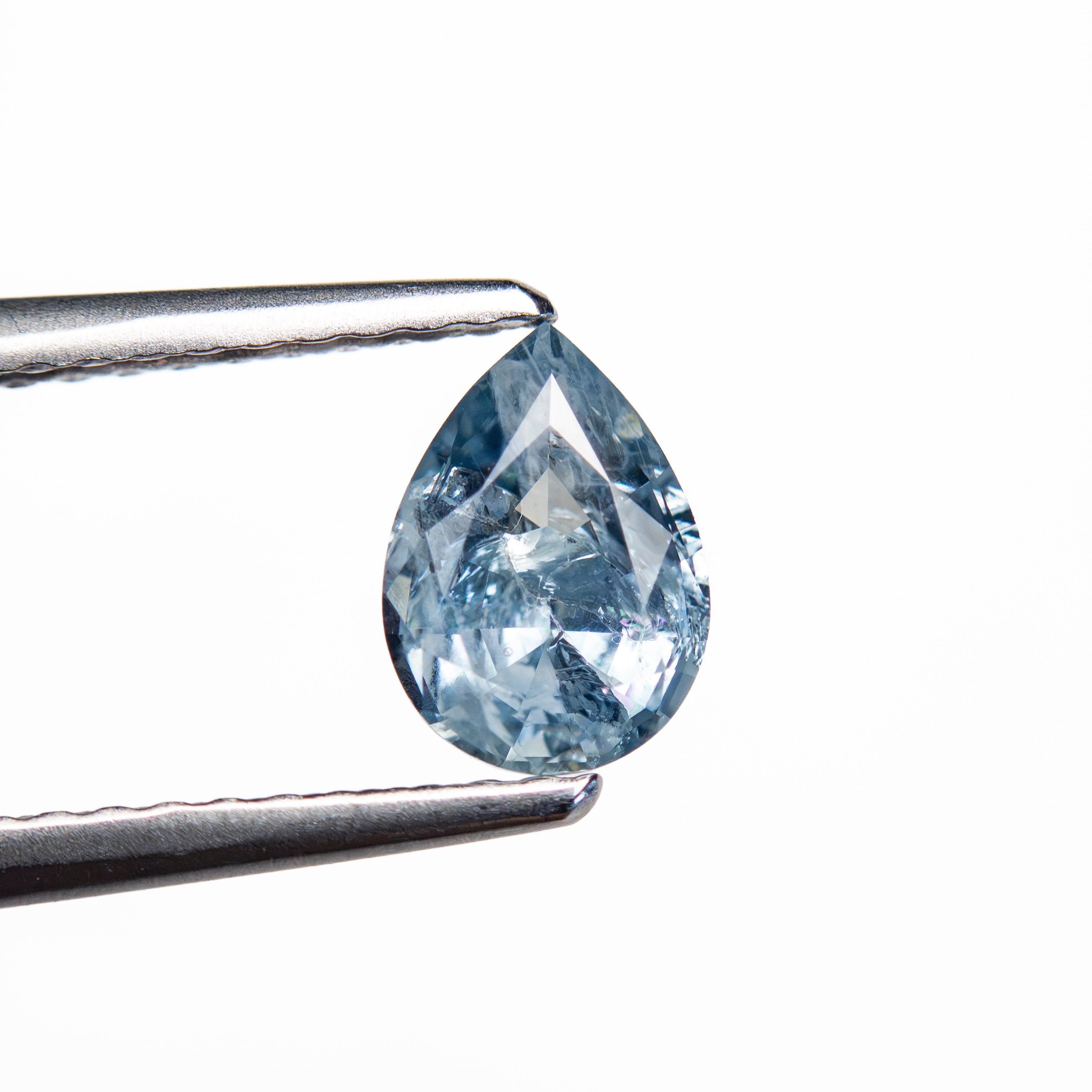 0.83ct 7.13x4.83x3.30mm Pear Brilliant Sapphire 26150-20 - Lelya - bespoke engagement and wedding rings made in Scotland, UK