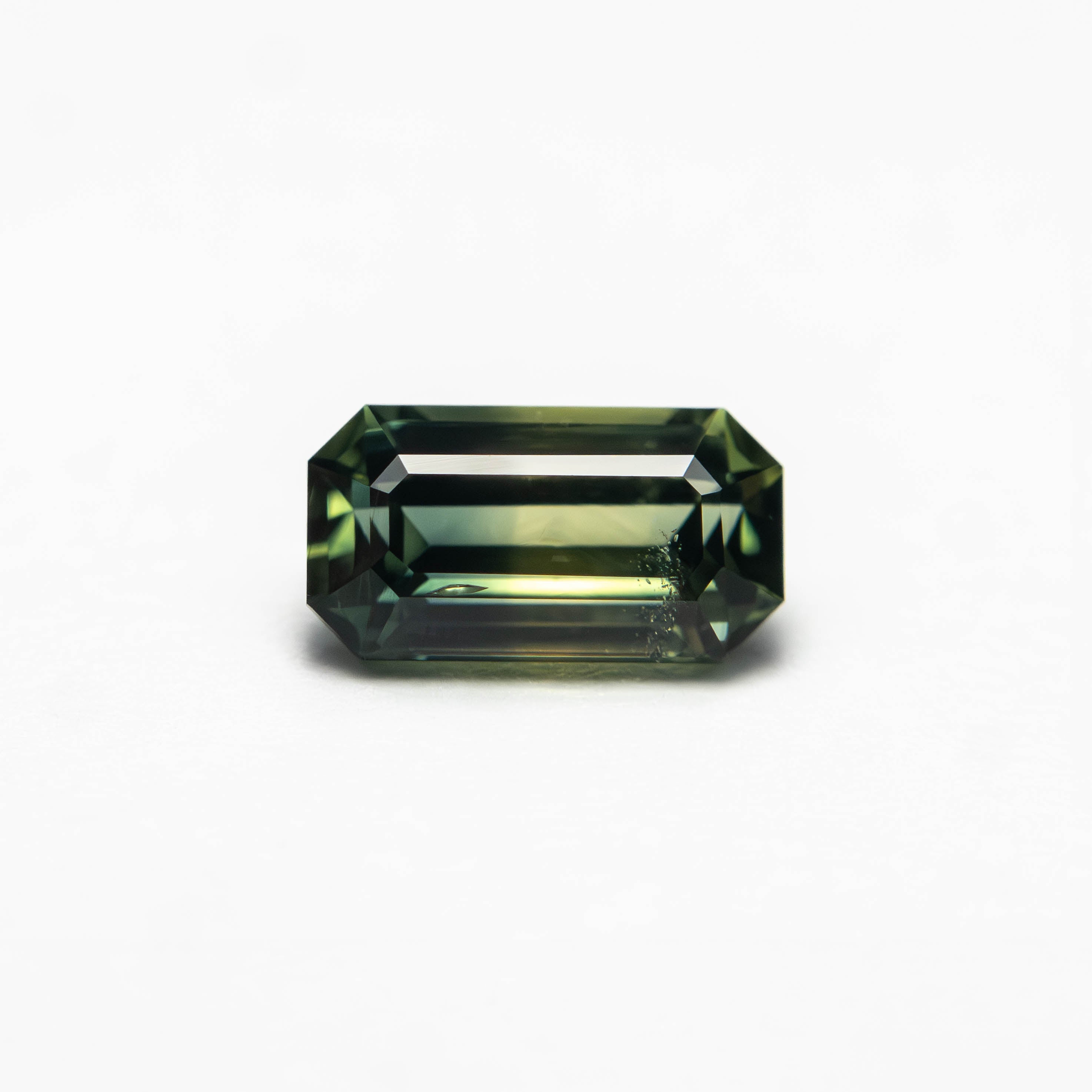0.85ct 6.97x3.80x3.00mm Cut Corner Rectangle Step Cut Sapphire 27336 - 50 - Lelya - bespoke engagement and wedding rings made in Scotland, UK