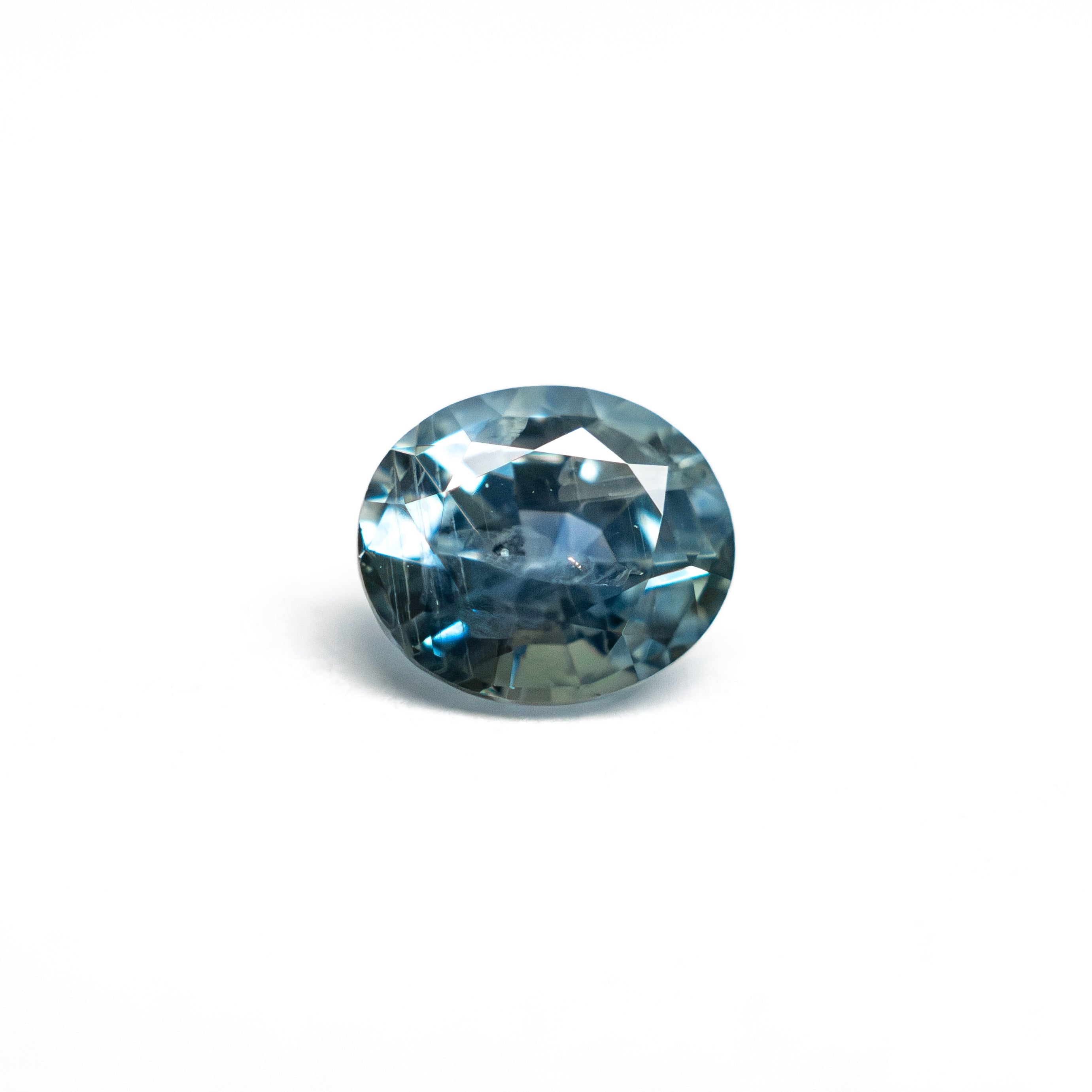 0.86ct 5.99x5.13x3.62mm Oval Brilliant Sapphire 26158-05 - Lelya - bespoke engagement and wedding rings made in Scotland, UK