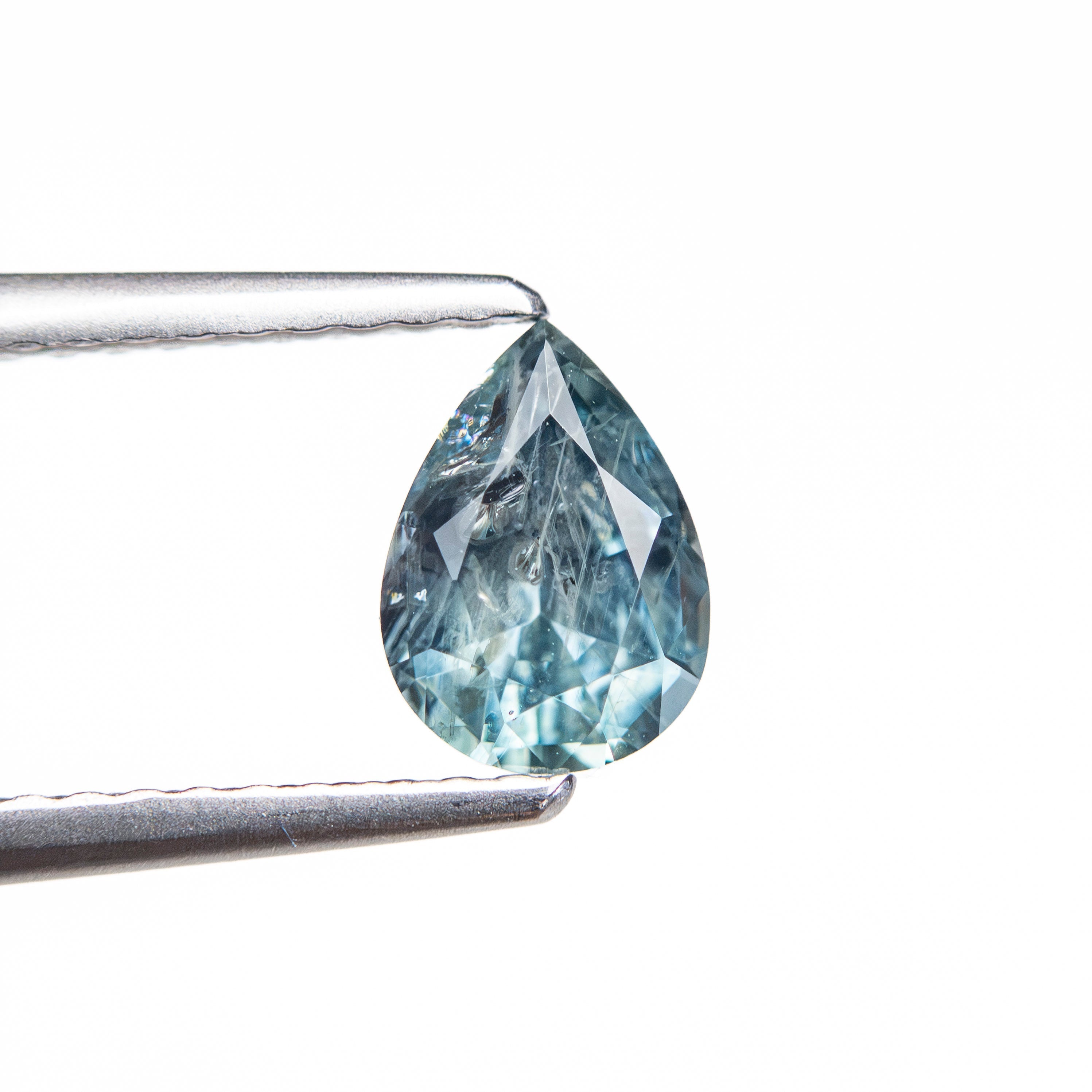 0.87ct 6.97x5.05x3.42mm Pear Brilliant Sapphire 26150-10 - Lelya - bespoke engagement and wedding rings made in Scotland, UK
