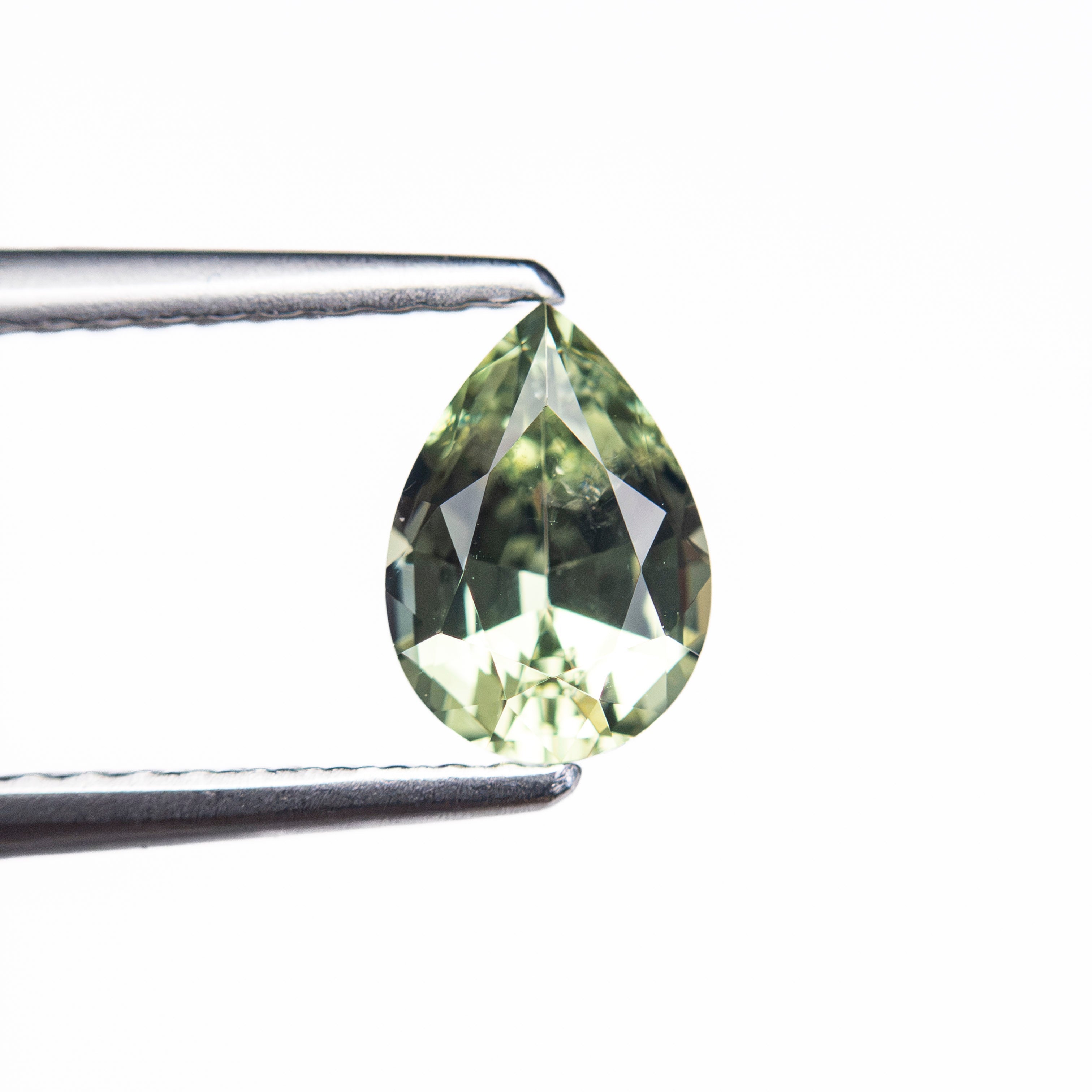 0.87ct 7.09x5.06x3.23mm Pear Brilliant Sapphire 26150-03 - Lelya - bespoke engagement and wedding rings made in Scotland, UK
