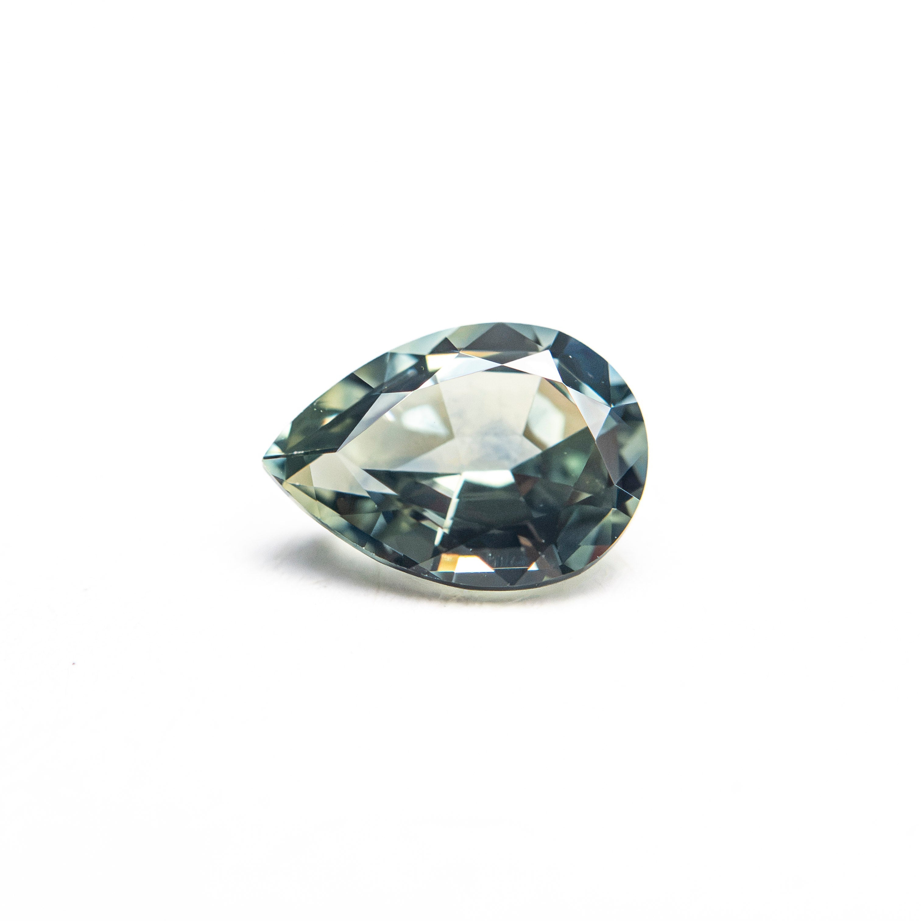 0.88ct 7.04x5.02x3.23mm Pear Brilliant Sapphire 26150-07 - Lelya - bespoke engagement and wedding rings made in Scotland, UK
