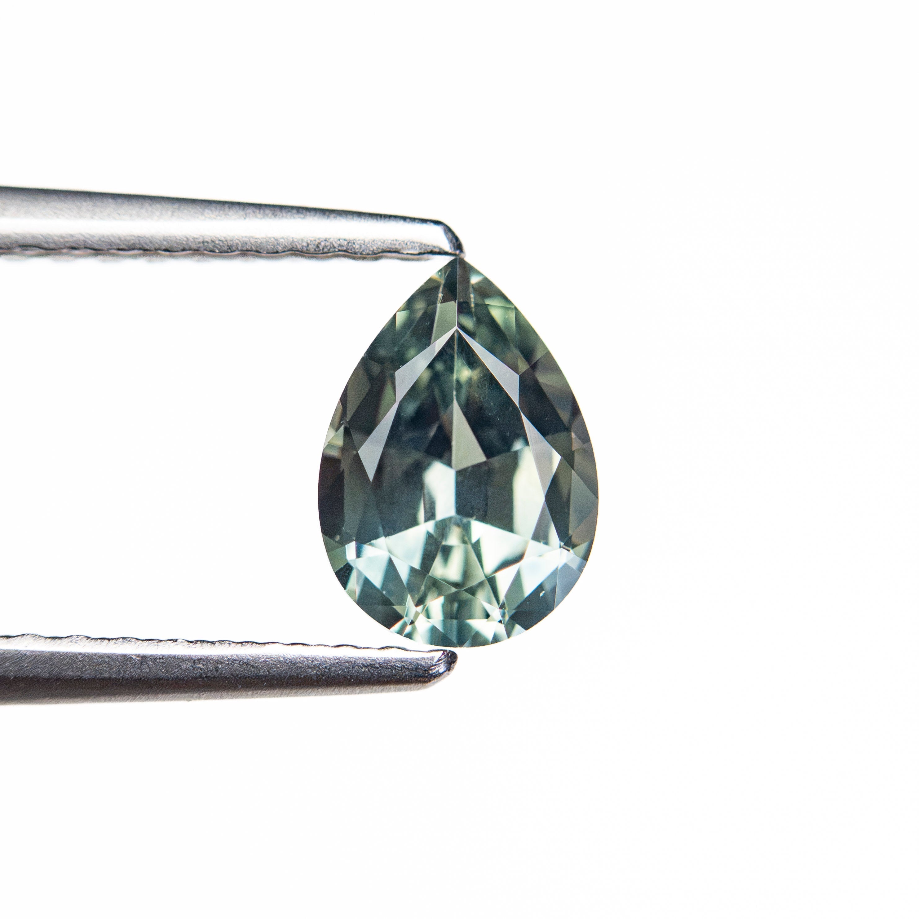 0.88ct 7.04x5.02x3.23mm Pear Brilliant Sapphire 26150-07 - Lelya - bespoke engagement and wedding rings made in Scotland, UK