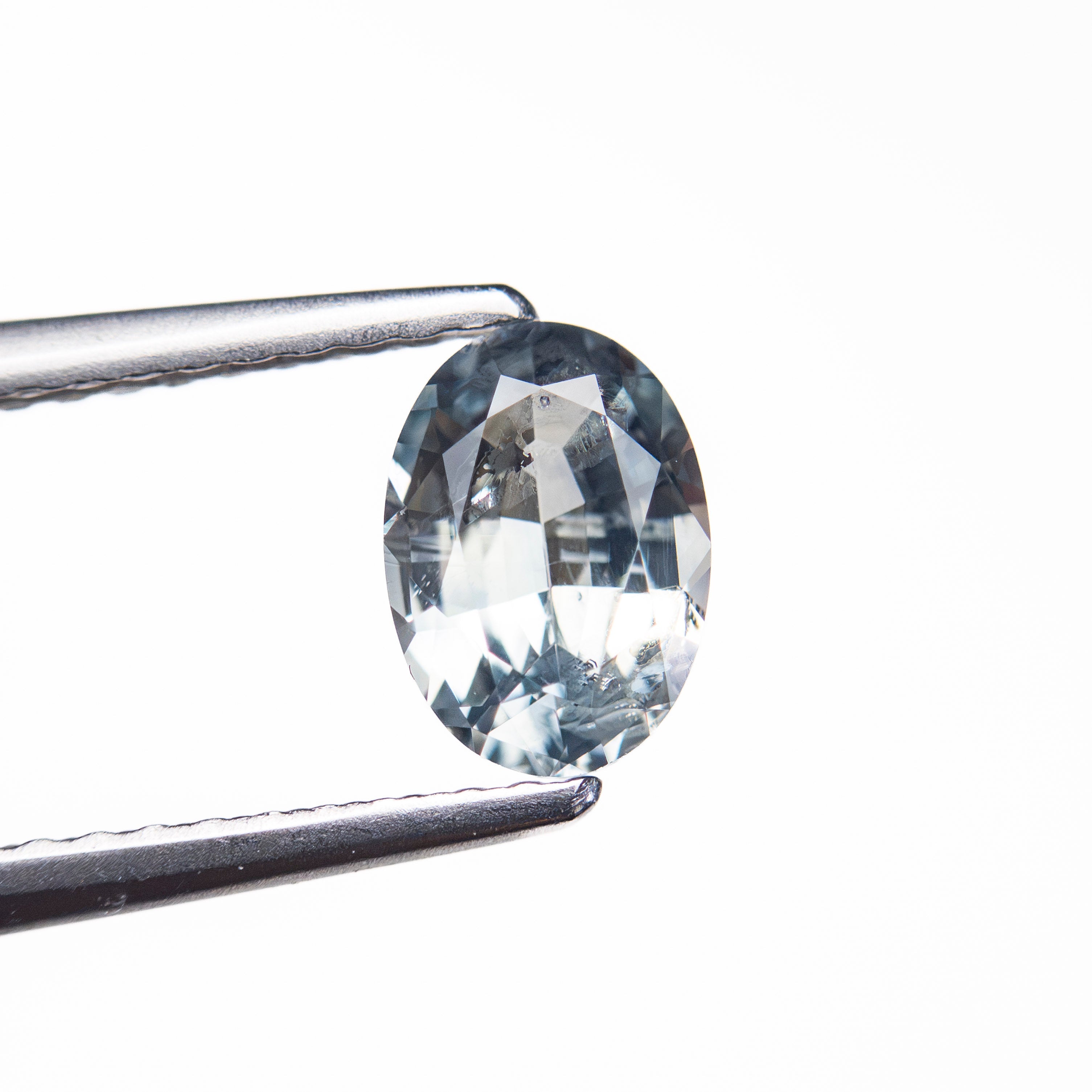 0.90ct 6.93x4.91x3.11mm Oval Brilliant Sapphire 26162-11 - Lelya - bespoke engagement and wedding rings made in Scotland, UK