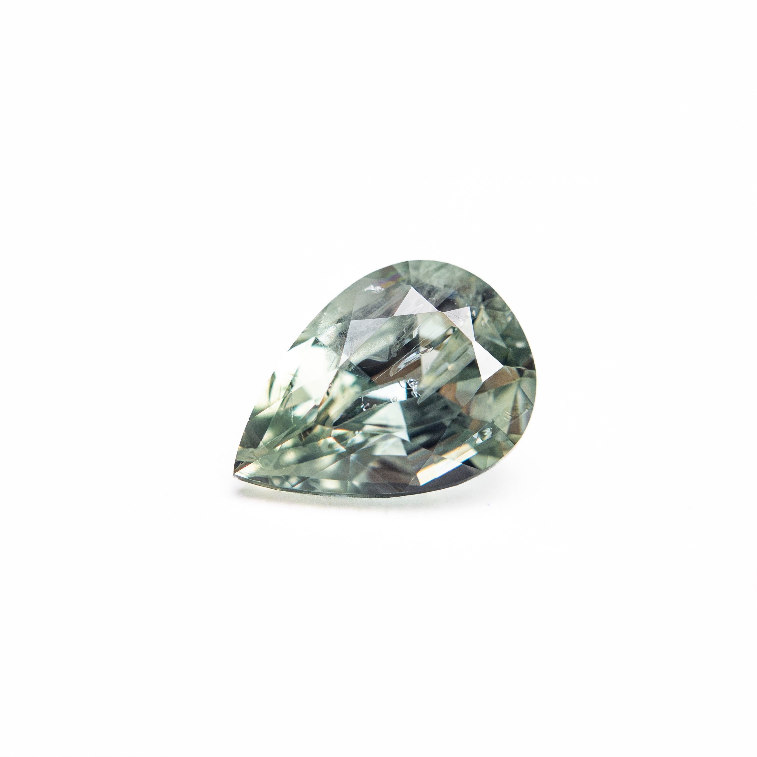 0.90ct 7.10x5.02x3.50mm Pear Brilliant Sapphire 26150-13 - Lelya - bespoke engagement and wedding rings made in Scotland, UK