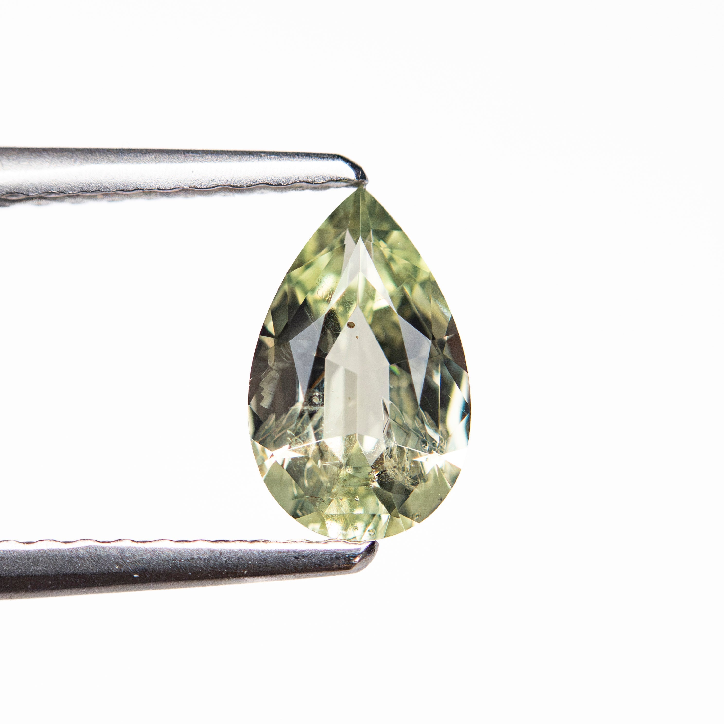 0.90ct 8.08x5.04x2.90mm Pear Brilliant Sapphire 26144-02 - Lelya - bespoke engagement and wedding rings made in Scotland, UK