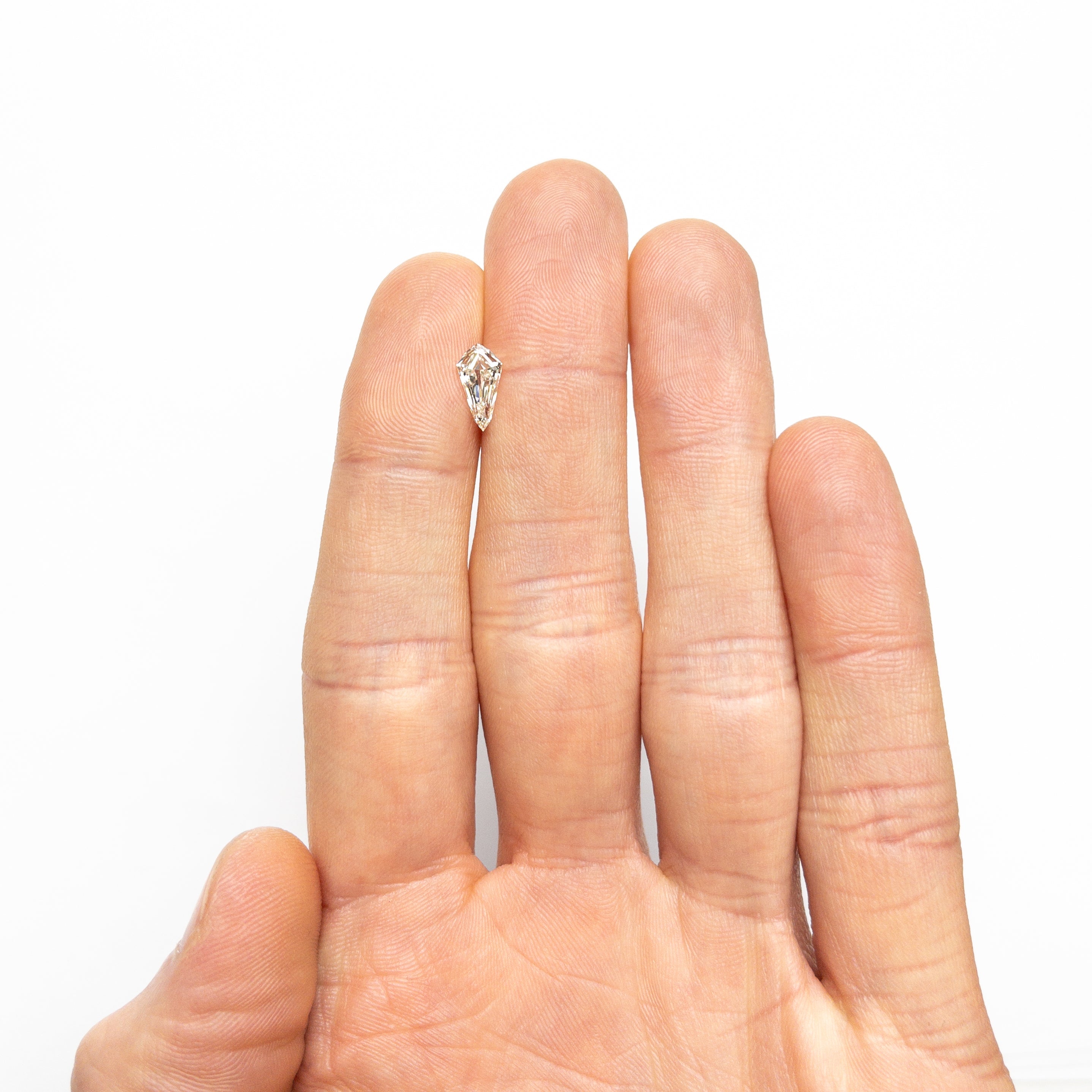 0.91ct 9.95x5.23x2.88mm SI1 K Shield Step Cut 25955 - 01 - Lelya - bespoke engagement and wedding rings made in Scotland, UK