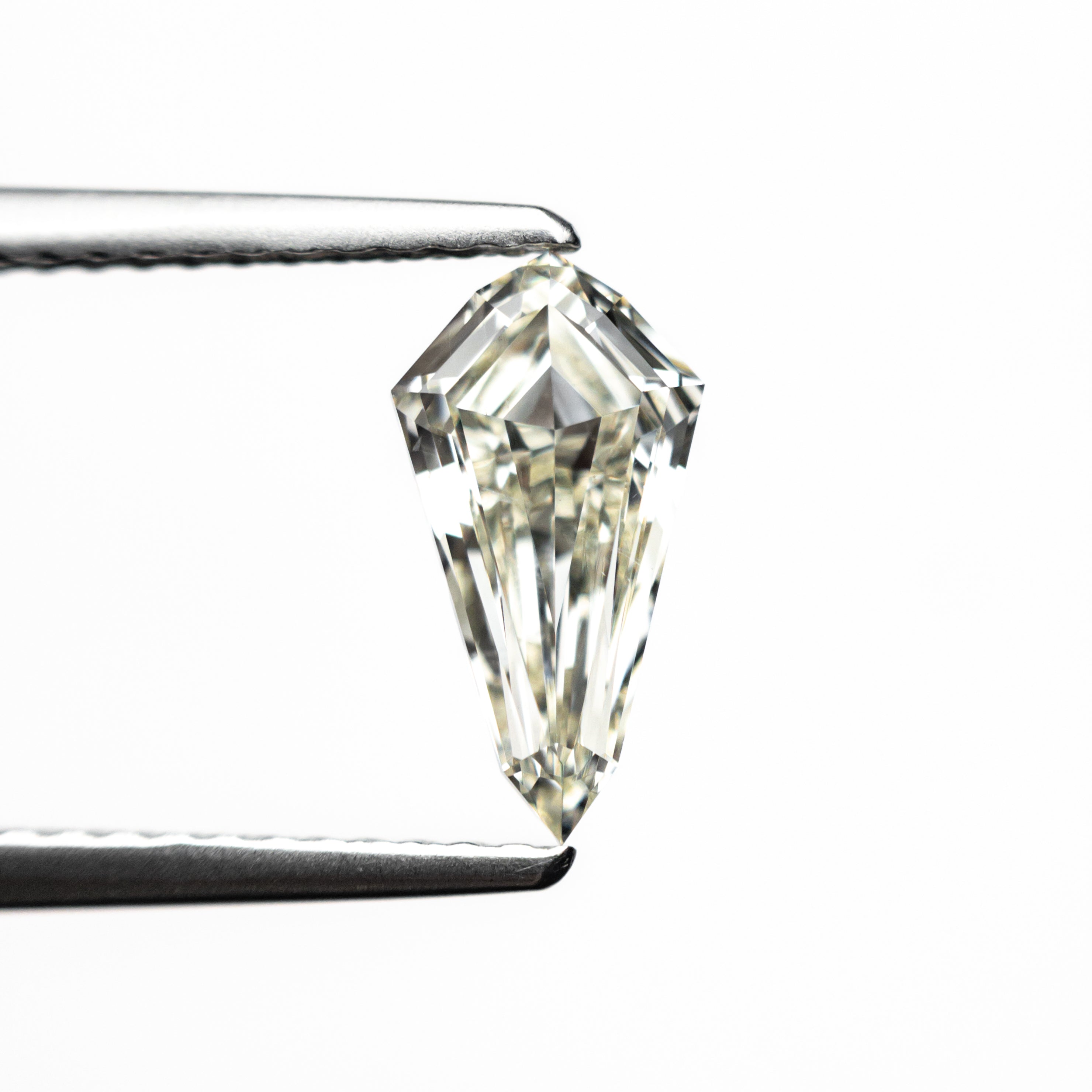 0.95ct 9.89x5.22x2.99mm SI1 L Shield Step Cut 25955 - 02 - Lelya - bespoke engagement and wedding rings made in Scotland, UK