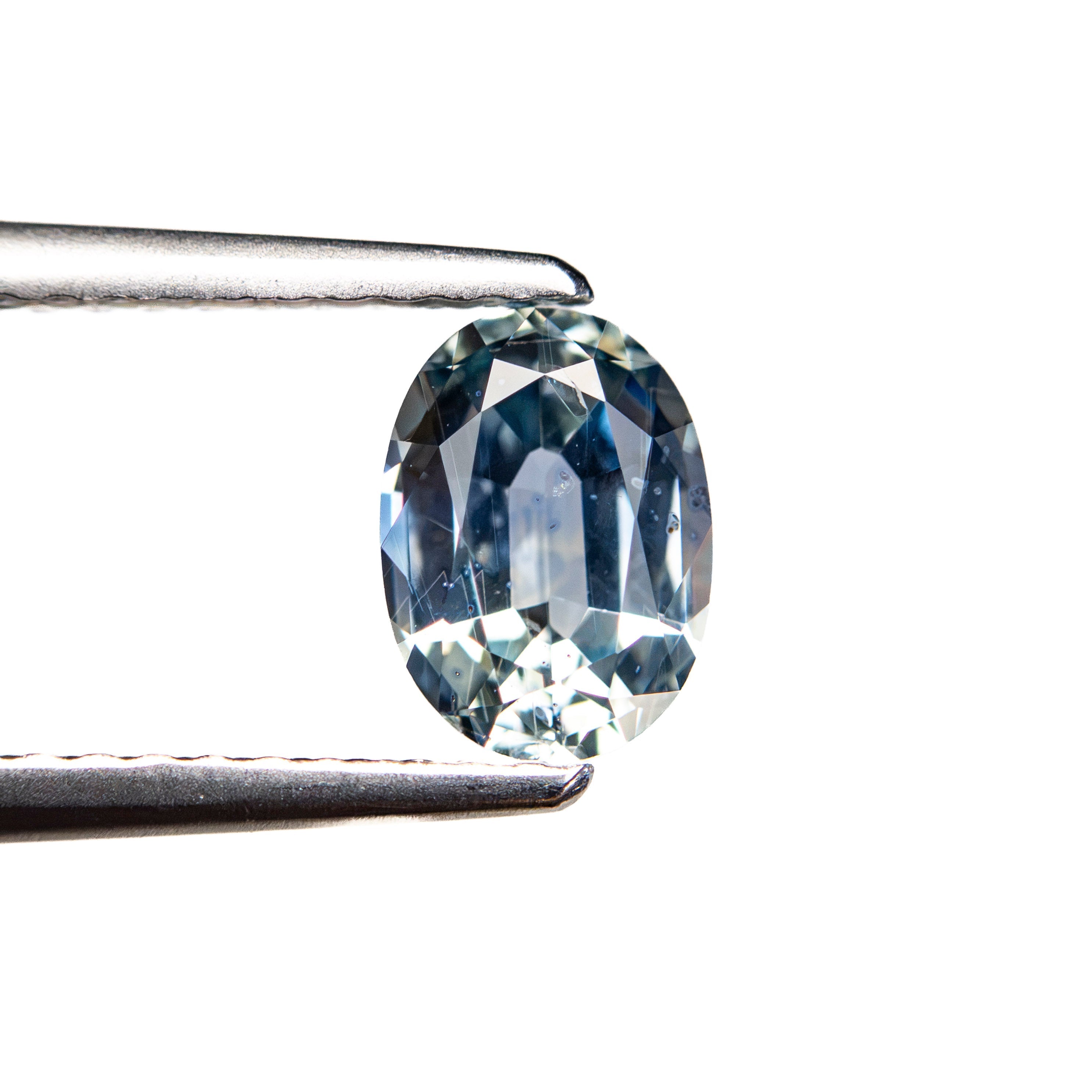 0.98ct 6.91x5.02x3.20mm Oval Brilliant Sapphire 26162-05 - Lelya - bespoke engagement and wedding rings made in Scotland, UK