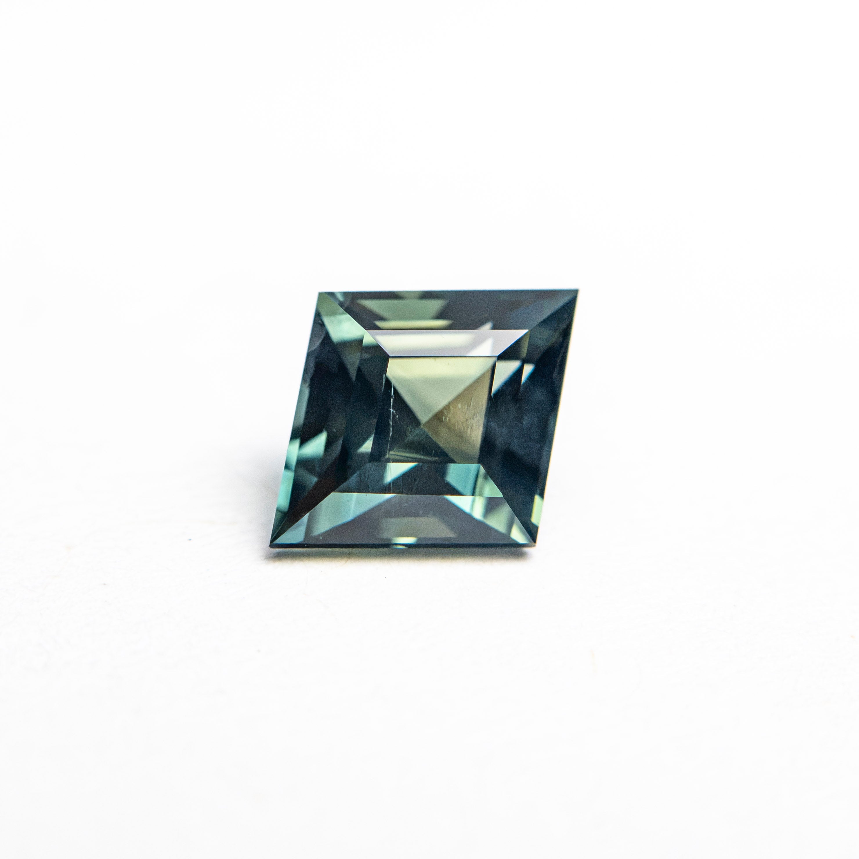 0.98ct 7.89x6.43x3.77mm Lozenge Step Cut Sapphire 28199-01 - Lelya - bespoke engagement and wedding rings made in Scotland, UK
