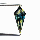 0.99ct 11.62x4.92x3.08mm Kite Step Cut Sapphire 27713-01 - Lelya - bespoke engagement and wedding rings made in Scotland, UK