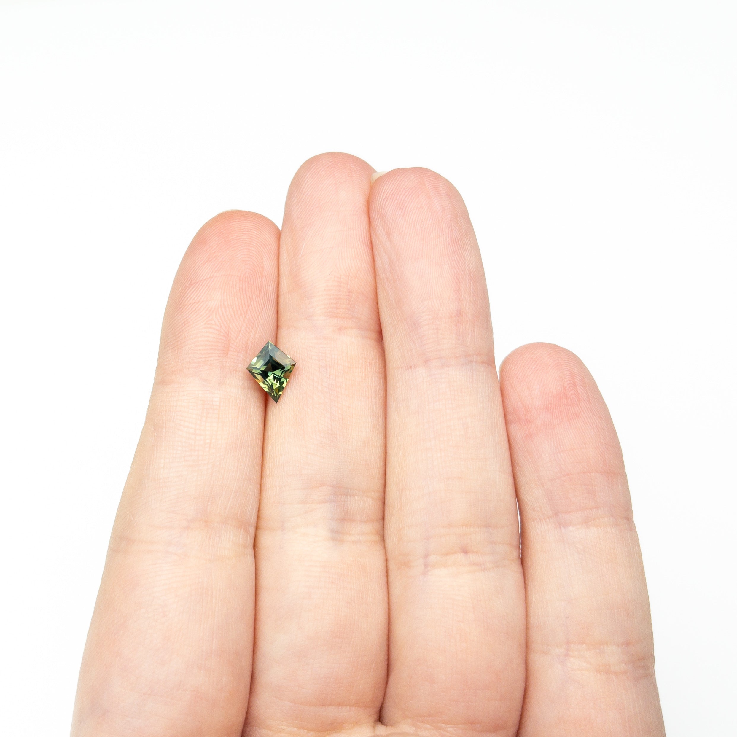 0.99ct 8.27x6.51x3.90mm Kite Step Cut Sapphire 27138 - 05 - Lelya - bespoke engagement and wedding rings made in Scotland, UK