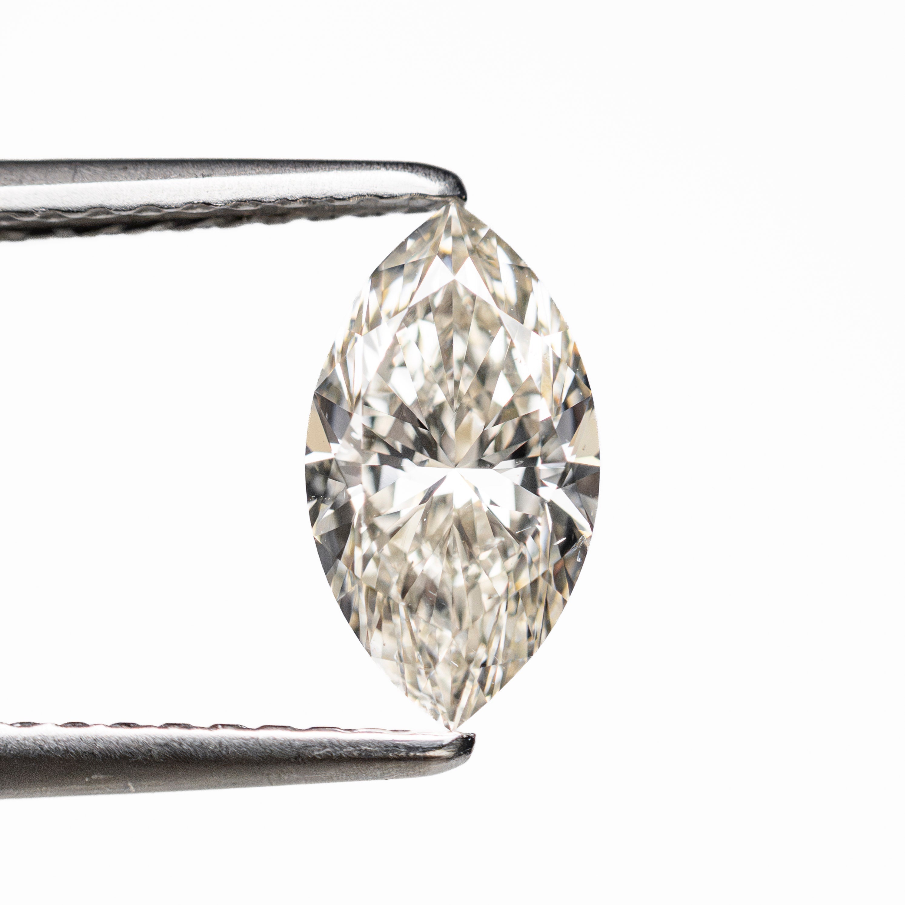 1.00ct 9.45x5.19x3.45mm SI2 M-N Marquise Brilliant 🇨🇦 28313-04 - Lelya - bespoke engagement and wedding rings made in Scotland, UK