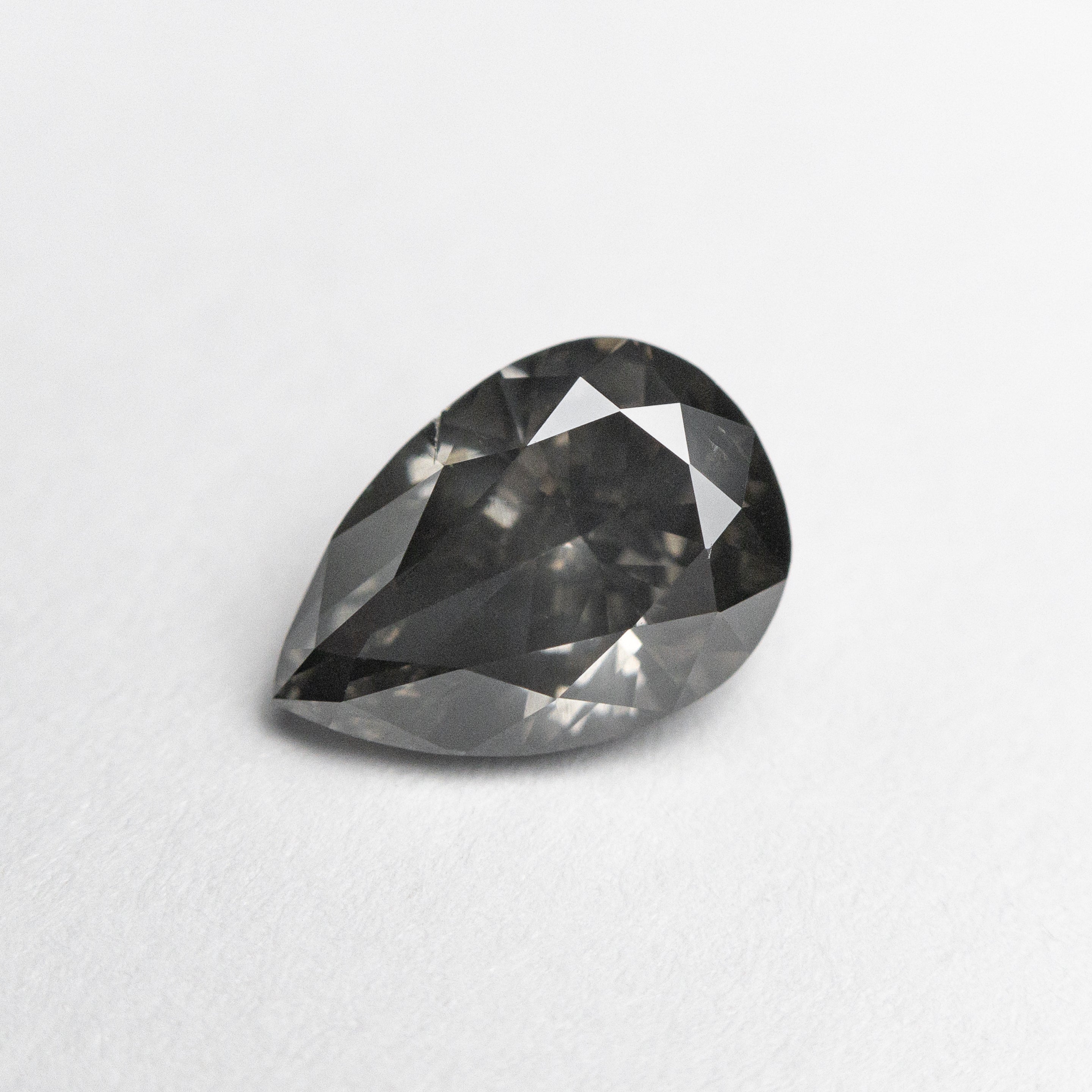 1.01ct 7.83x5.42x3.38mm Fancy Dark Grey Pear Brilliant 19913 - 01 - Lelya - bespoke engagement and wedding rings made in Scotland, UK