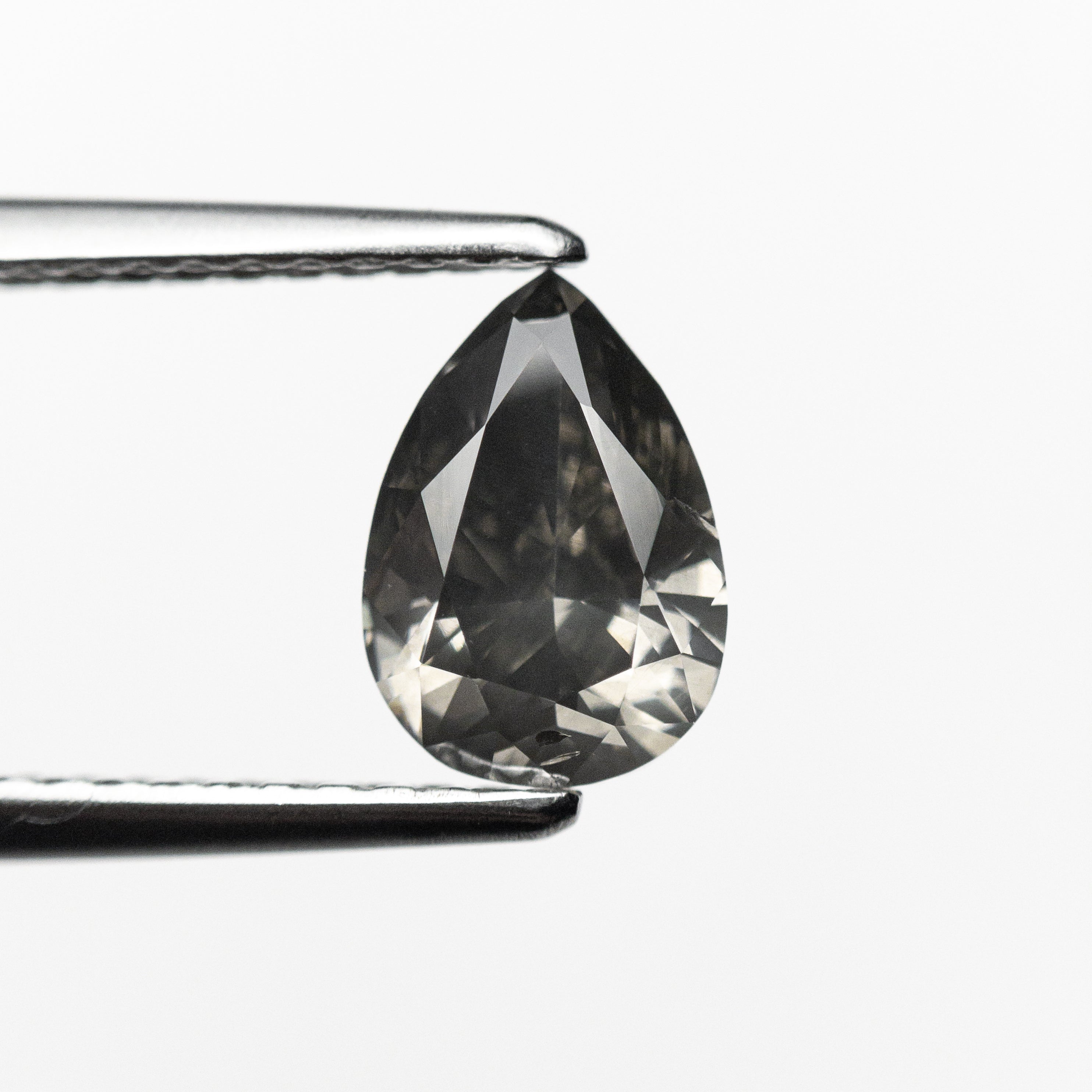 1.01ct 7.83x5.42x3.38mm Fancy Dark Grey Pear Brilliant 19913 - 01 - Lelya - bespoke engagement and wedding rings made in Scotland, UK