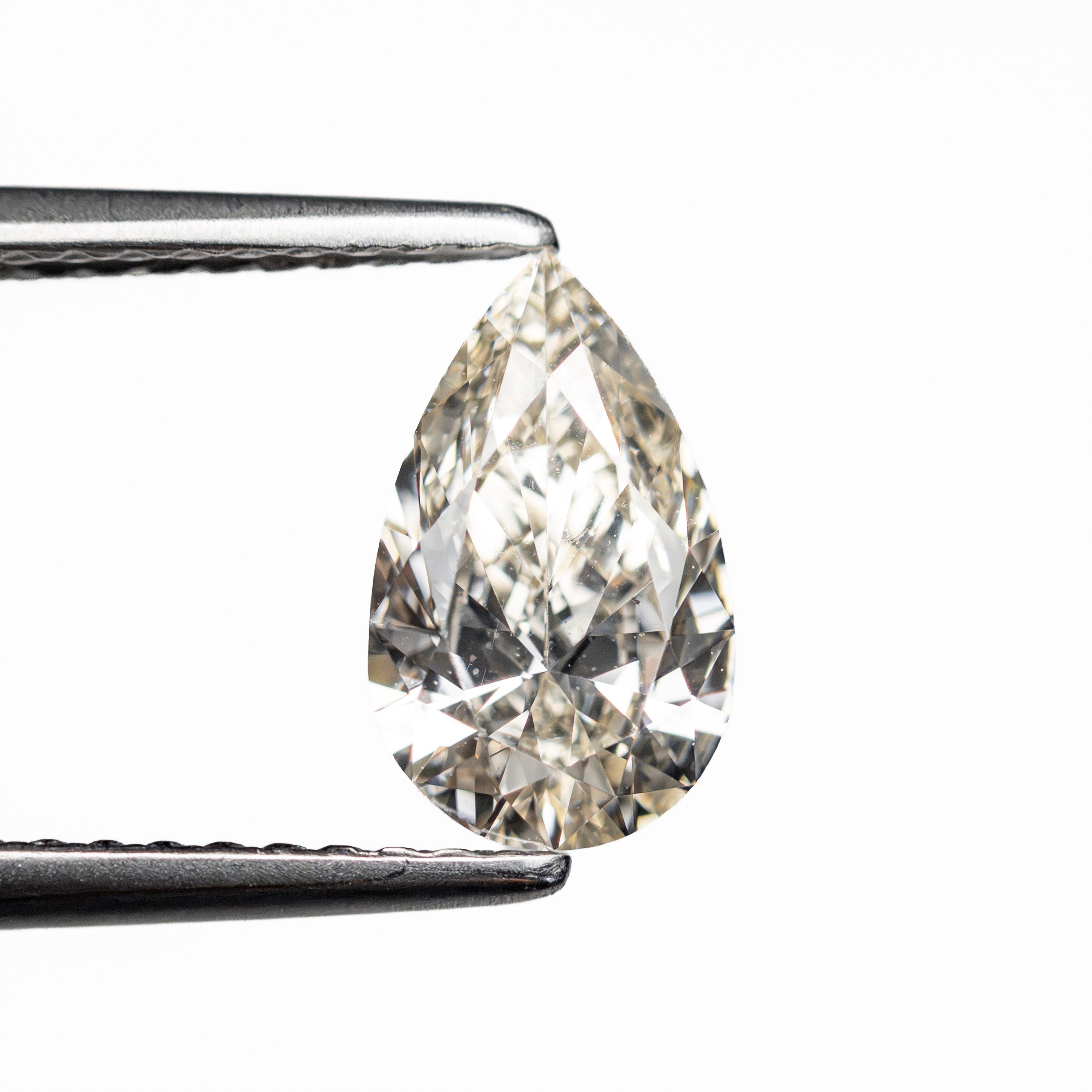 1.01ct 9.19x5.57x3.26mm VS2 M-N Pear Brilliant 🇨🇦 28313-13 - Lelya - bespoke engagement and wedding rings made in Scotland, UK