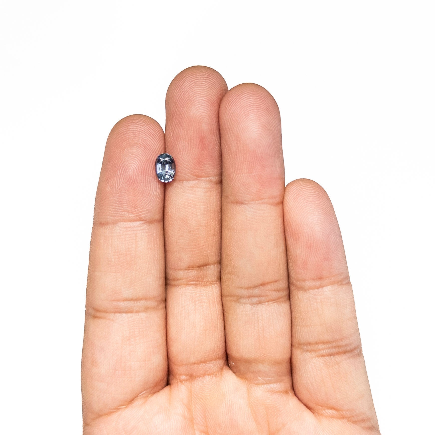 1.02ct 6.90x5.00x3.52mm Oval Brilliant Sapphire 26162-01 - Lelya - bespoke engagement and wedding rings made in Scotland, UK