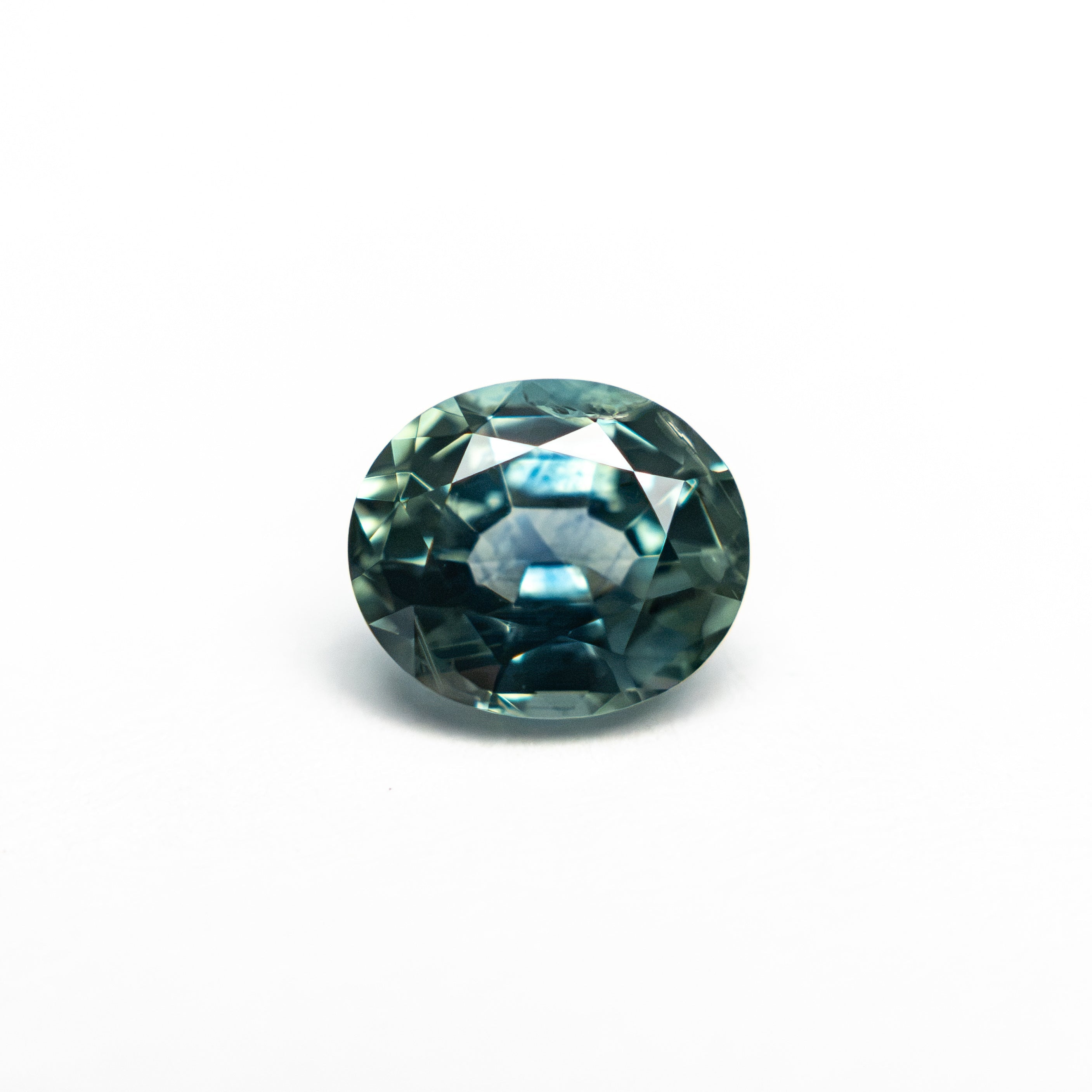 1.03ct 6.46x5.55x3.47mm Oval Brilliant Sapphire 26161-01 - Lelya - bespoke engagement and wedding rings made in Scotland, UK