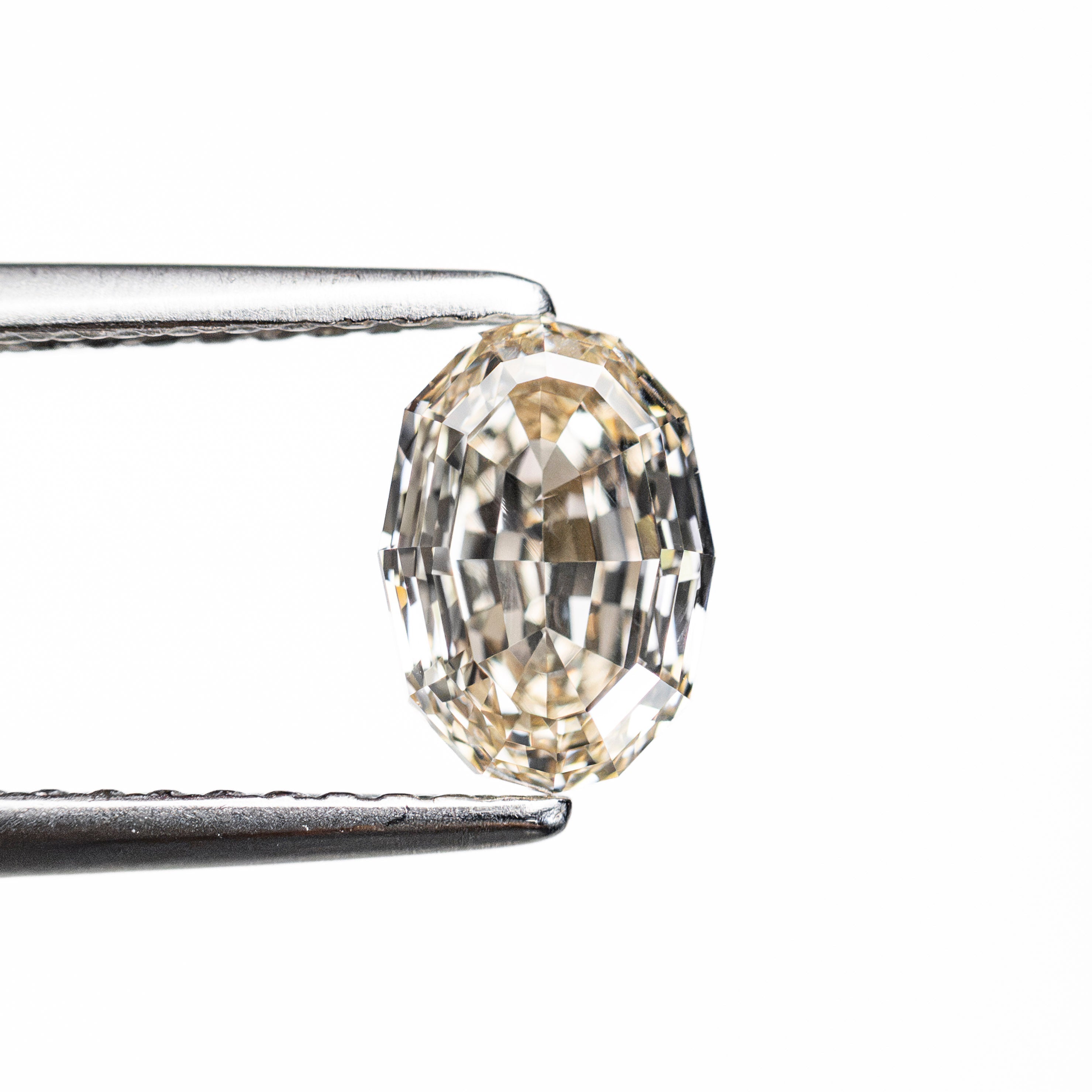 1.03ct 7.15x5.04x3.35mm VS2 O-P Geo Oval Step Cut 🇨🇦 28324-04 - Lelya - bespoke engagement and wedding rings made in Scotland, UK