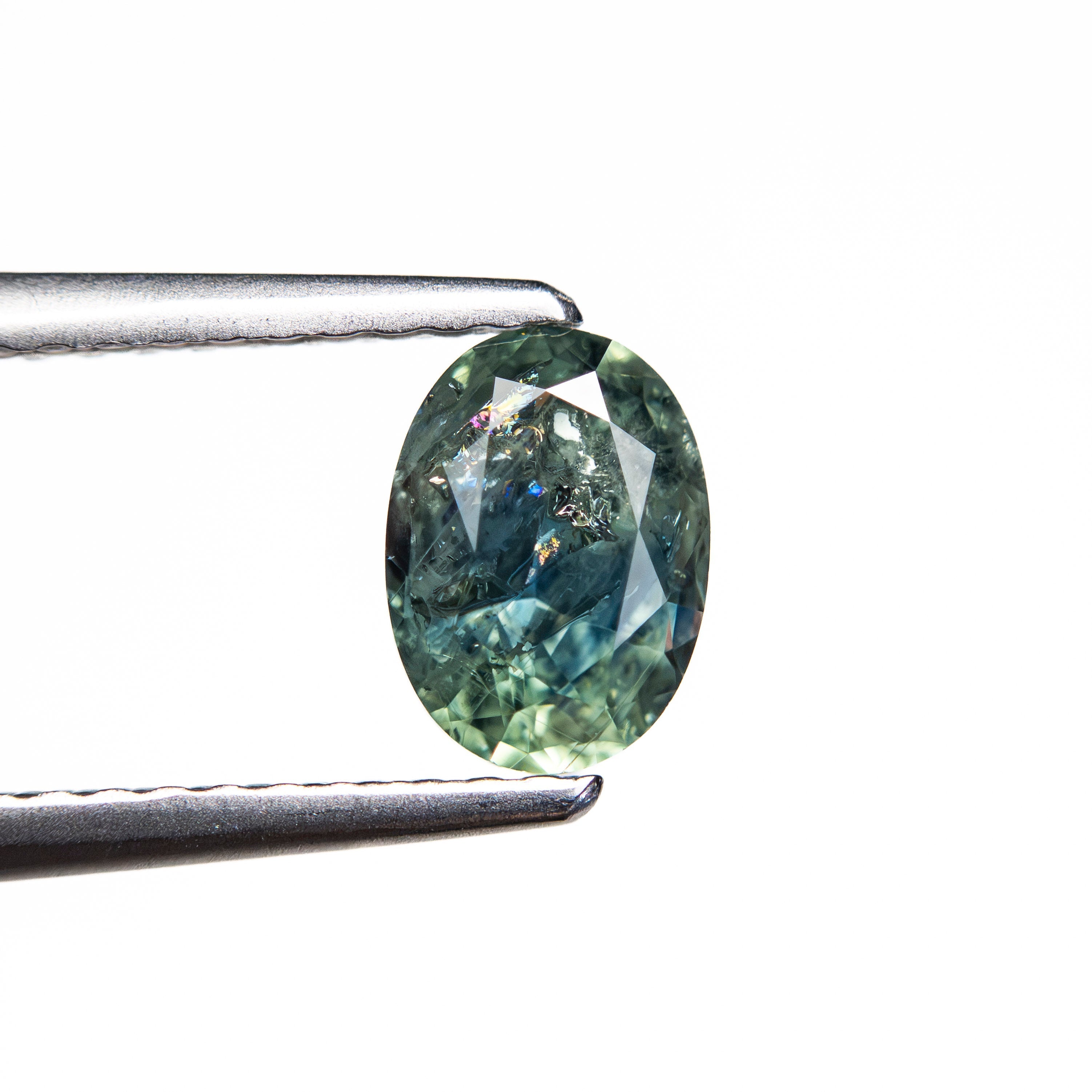 1.05ct 6.79x4.91x3.63mm Oval Brilliant Sapphire 26162-07 - Lelya - bespoke engagement and wedding rings made in Scotland, UK