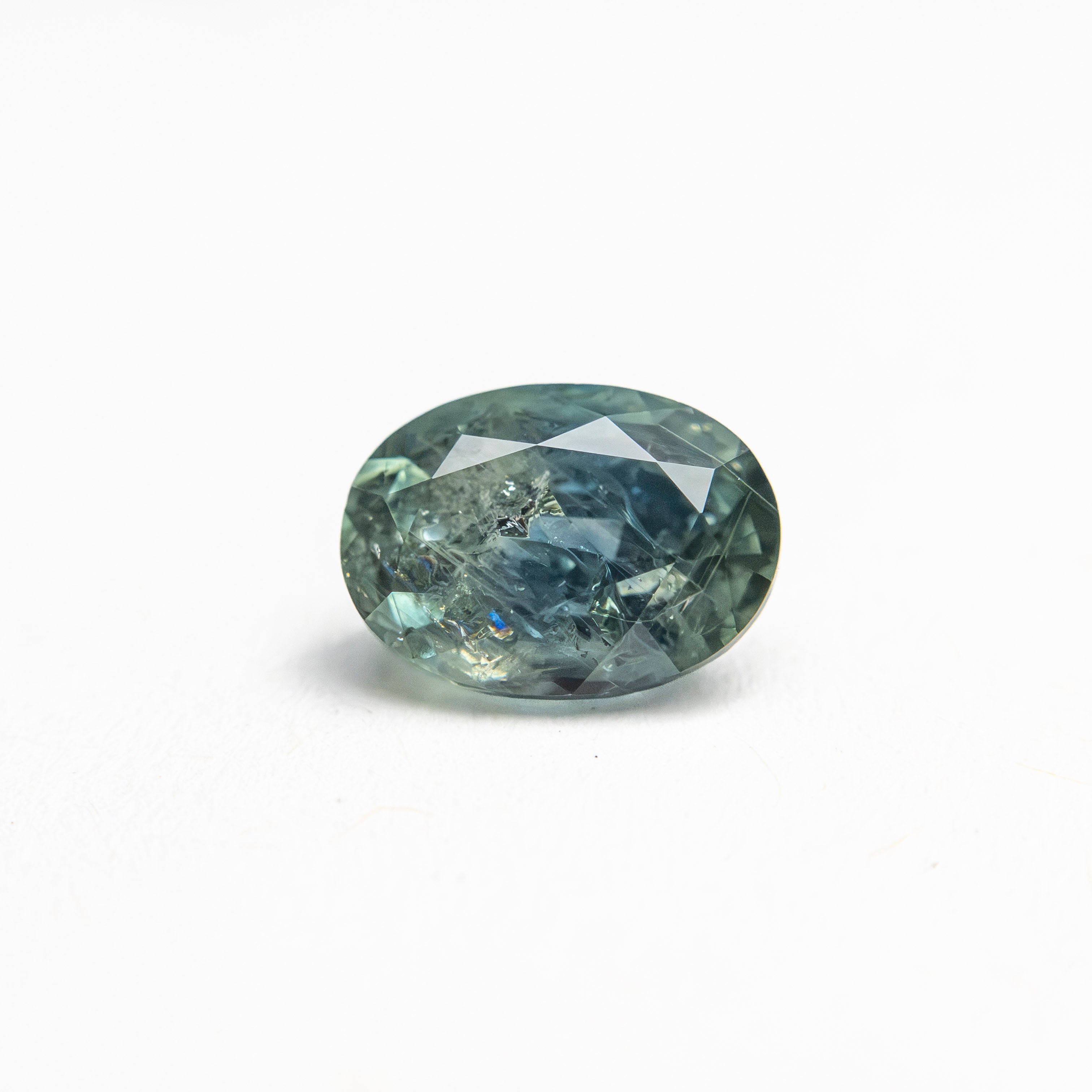 1.05ct 6.79x4.91x3.63mm Oval Brilliant Sapphire 26162-07 - Lelya - bespoke engagement and wedding rings made in Scotland, UK