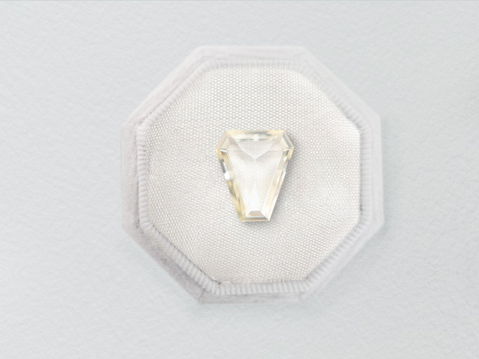 1.05ct Light Yellow Shield Cut Step Cut Sapphire - Lelya - bespoke engagement and wedding rings made in Scotland, UK