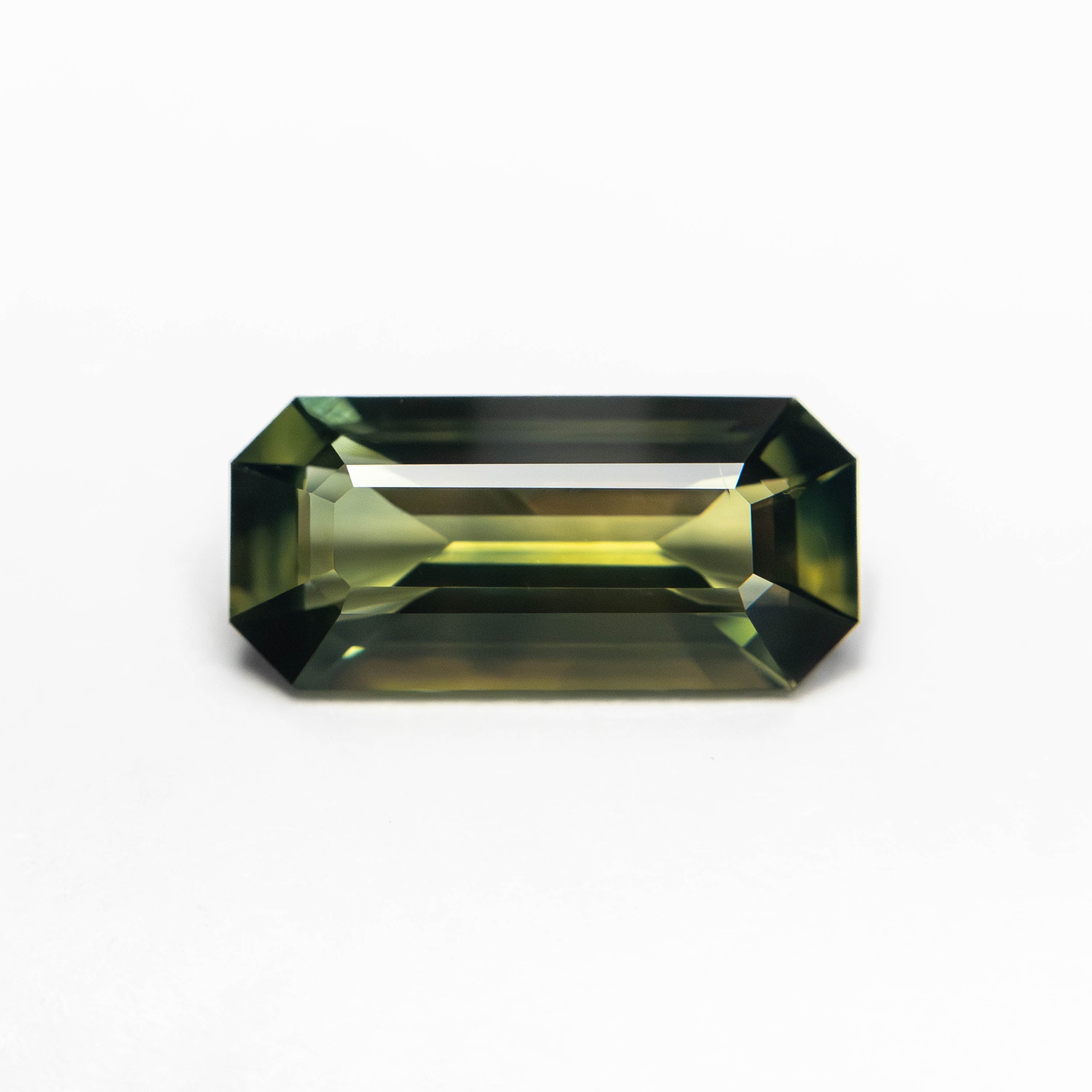1.10ct 9.42x4.42x2.71mm Cut Corner Rectangle Step Cut Sapphire 27329 - 01 - Lelya - bespoke engagement and wedding rings made in Scotland, UK