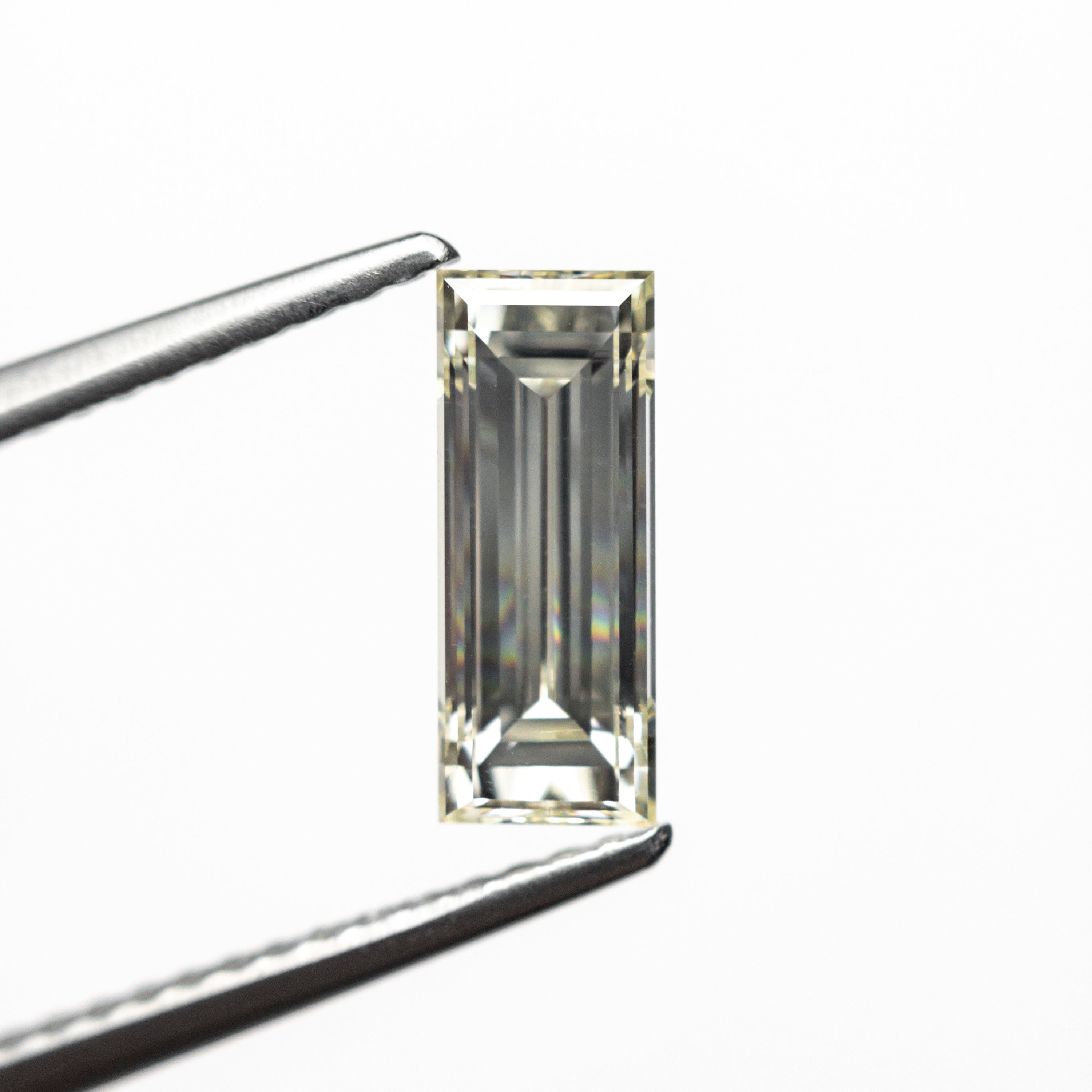 1.11ct 9.55x3.80x2.97mm VS2 O - P Baguette Step Cut 26124 - 02 - Lelya - bespoke engagement and wedding rings made in Scotland, UK