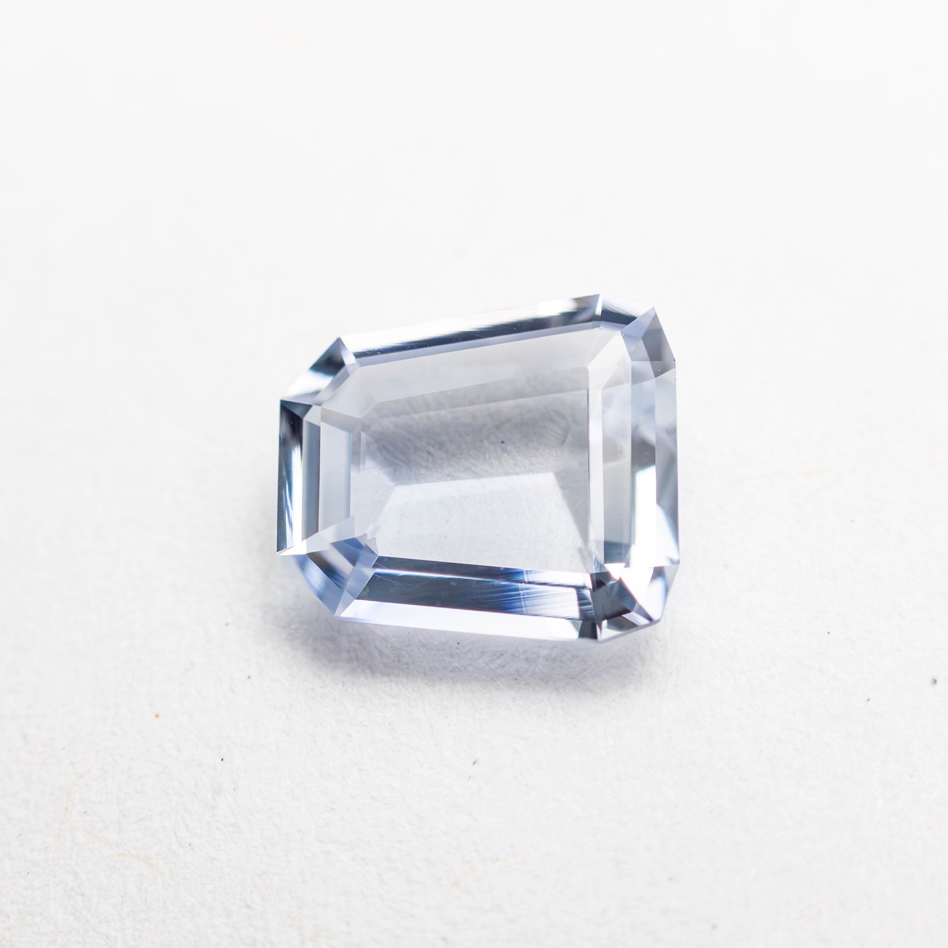 1.12ct 6.95x6.31x2.41mm Trapezoid Step Cut Sapphire 27740-17 - Lelya - bespoke engagement and wedding rings made in Scotland, UK