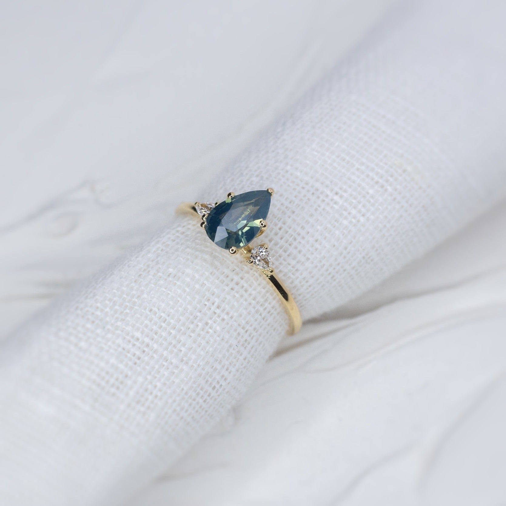 1.13ct Pear Teal Sapphire Gaia Triad Ring - Lelya - bespoke engagement and wedding rings made in Scotland, UK