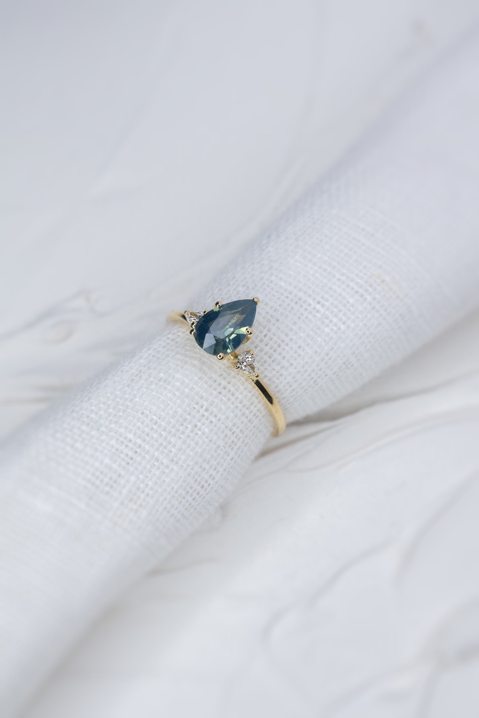 1.13ct Pear Teal Sapphire Gaia Triad Ring - Lelya - bespoke engagement and wedding rings made in Scotland, UK