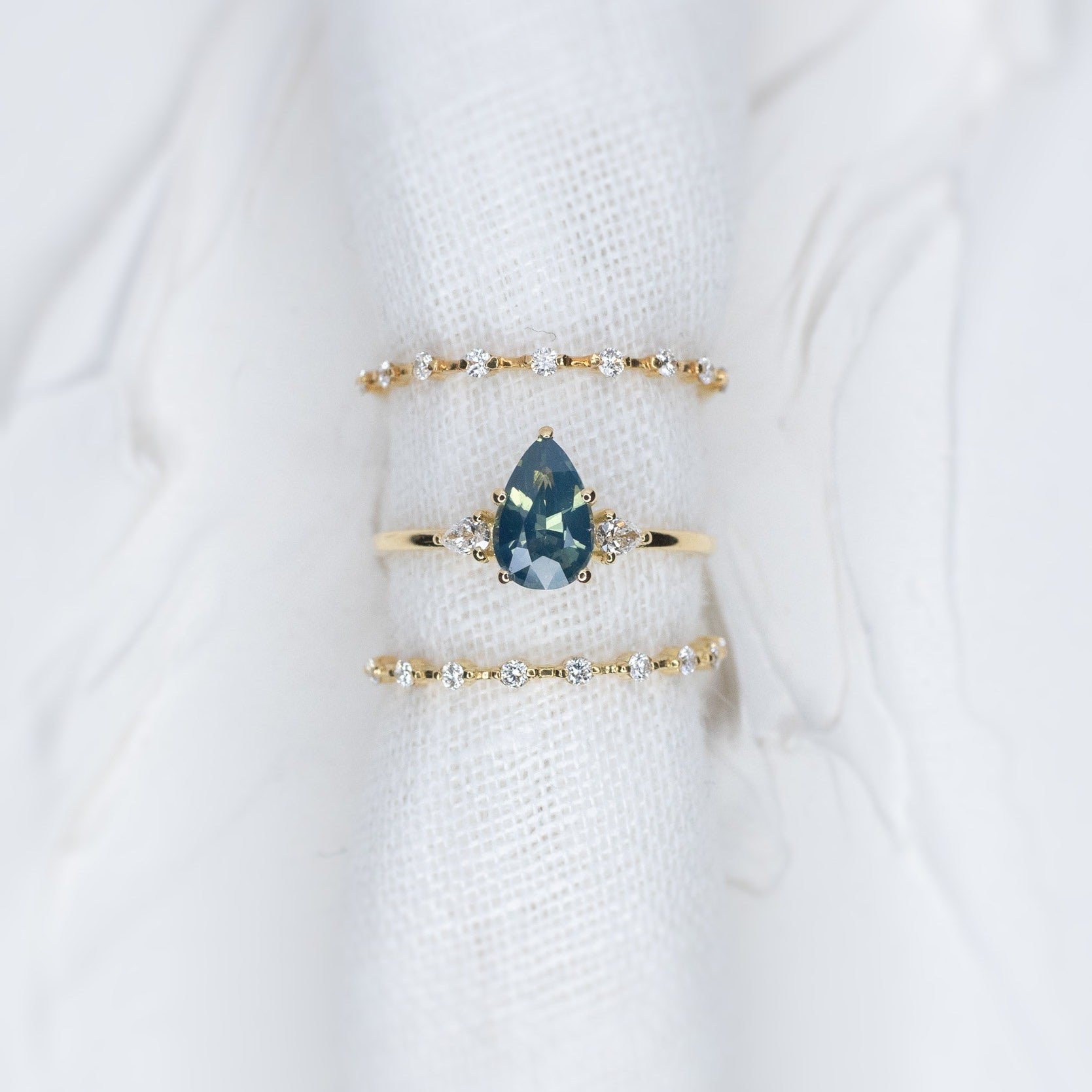 1.13ct Pear Teal Sapphire Gaia Triad Ring - Lelya - bespoke engagement and wedding rings made in Scotland, UK