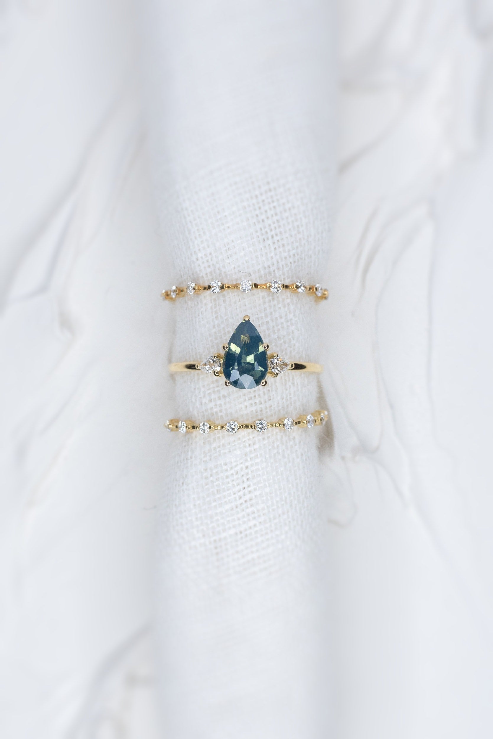 1.13ct Pear Teal Sapphire Gaia Triad Ring - Lelya - bespoke engagement and wedding rings made in Scotland, UK