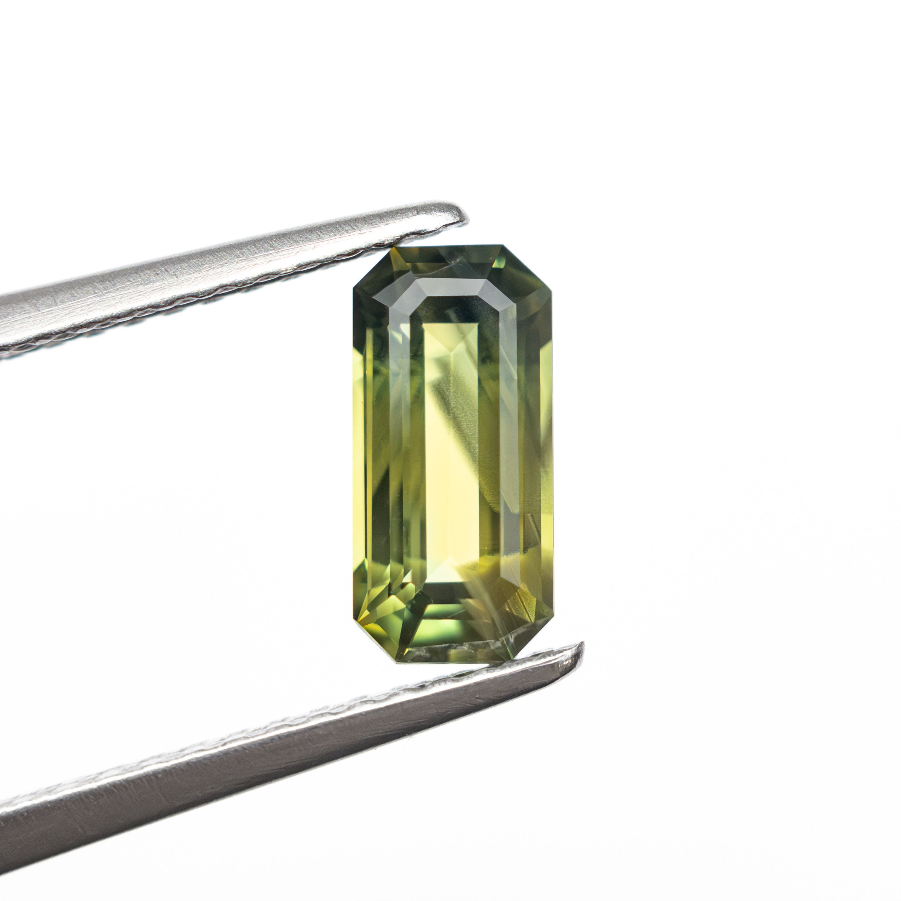 1.20ct 8.69x4.15x3.05mm Cut Corner Rectangle Step Cut Sapphire 27353 - 01 - Lelya - bespoke engagement and wedding rings made in Scotland, UK