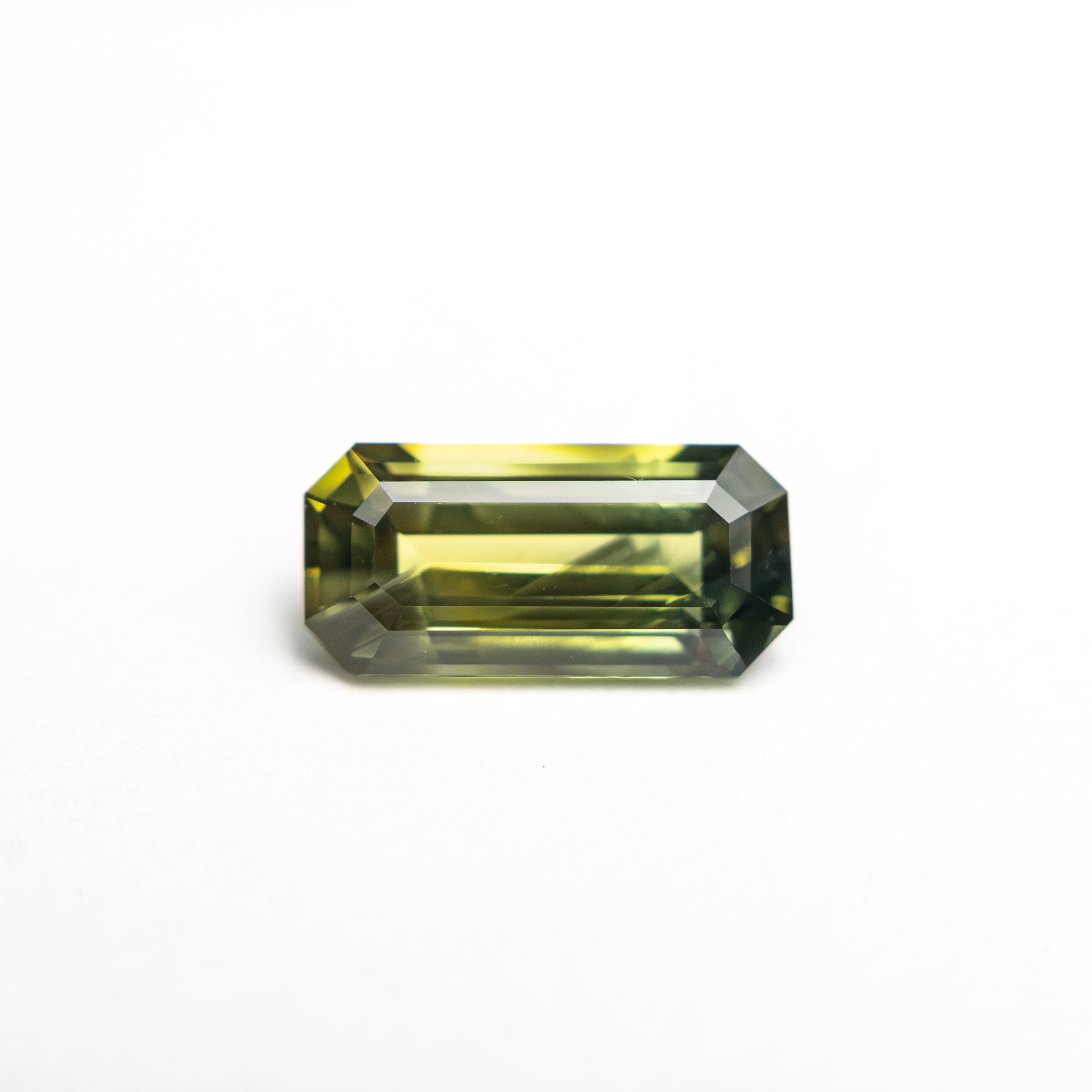 1.20ct 8.69x4.15x3.05mm Cut Corner Rectangle Step Cut Sapphire 27353 - 01 - Lelya - bespoke engagement and wedding rings made in Scotland, UK
