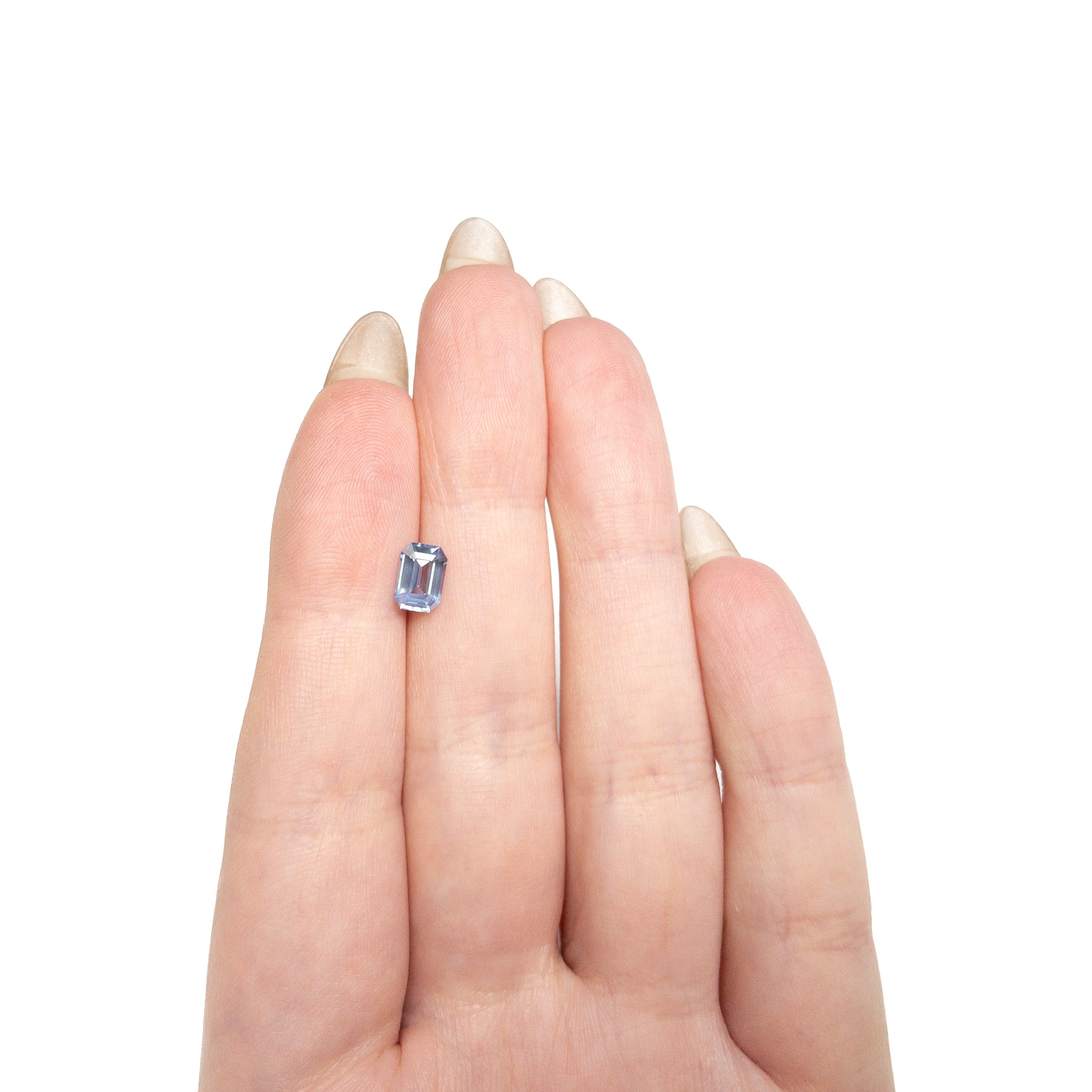 1.21ct 7.11x4.93x3.33mm Cut Corner Rectangle Step Cut Sapphire 28209-01 - Lelya - bespoke engagement and wedding rings made in Scotland, UK
