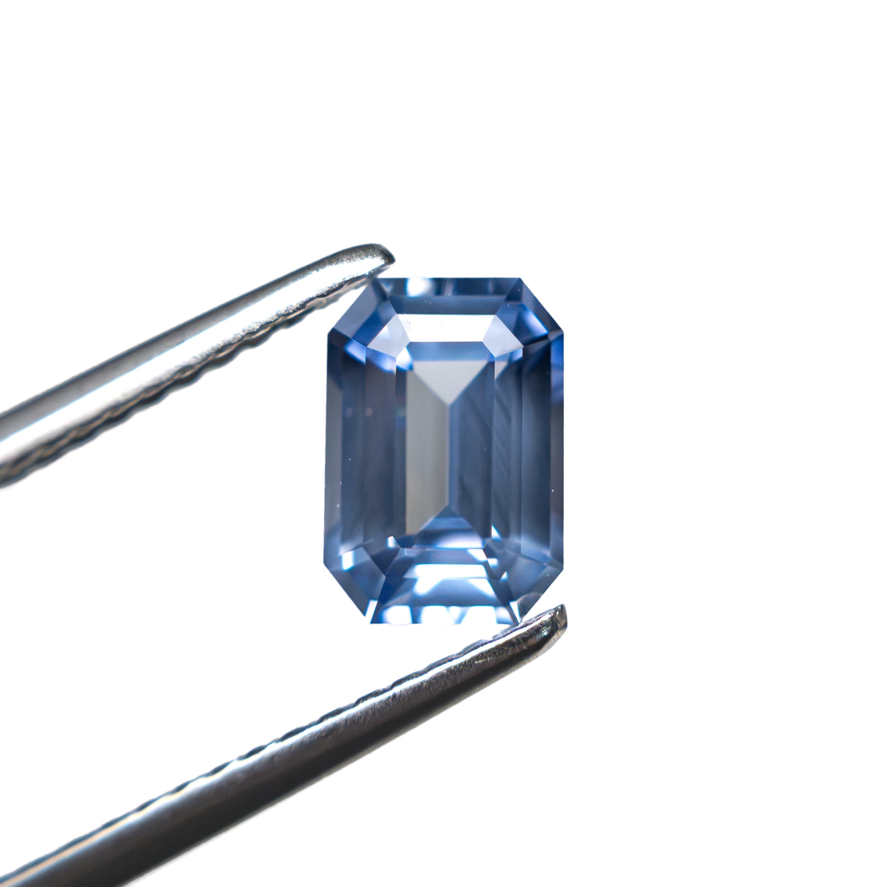 1.21ct 7.11x4.93x3.33mm Cut Corner Rectangle Step Cut Sapphire 28209-01 - Lelya - bespoke engagement and wedding rings made in Scotland, UK