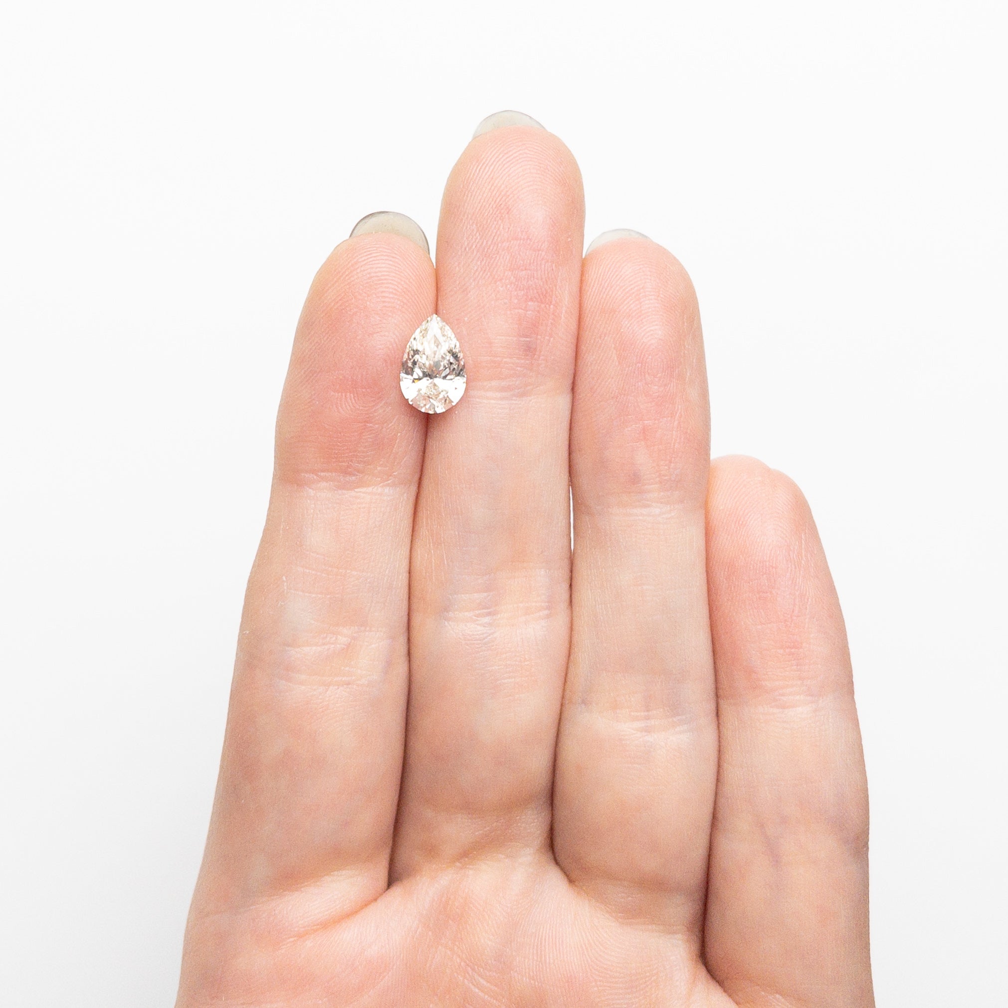 1.21ct 9.04x5.99x3.65mm VVS2 K Pear Brilliant 🇨🇦 26120 - 05 - Lelya - bespoke engagement and wedding rings made in Scotland, UK