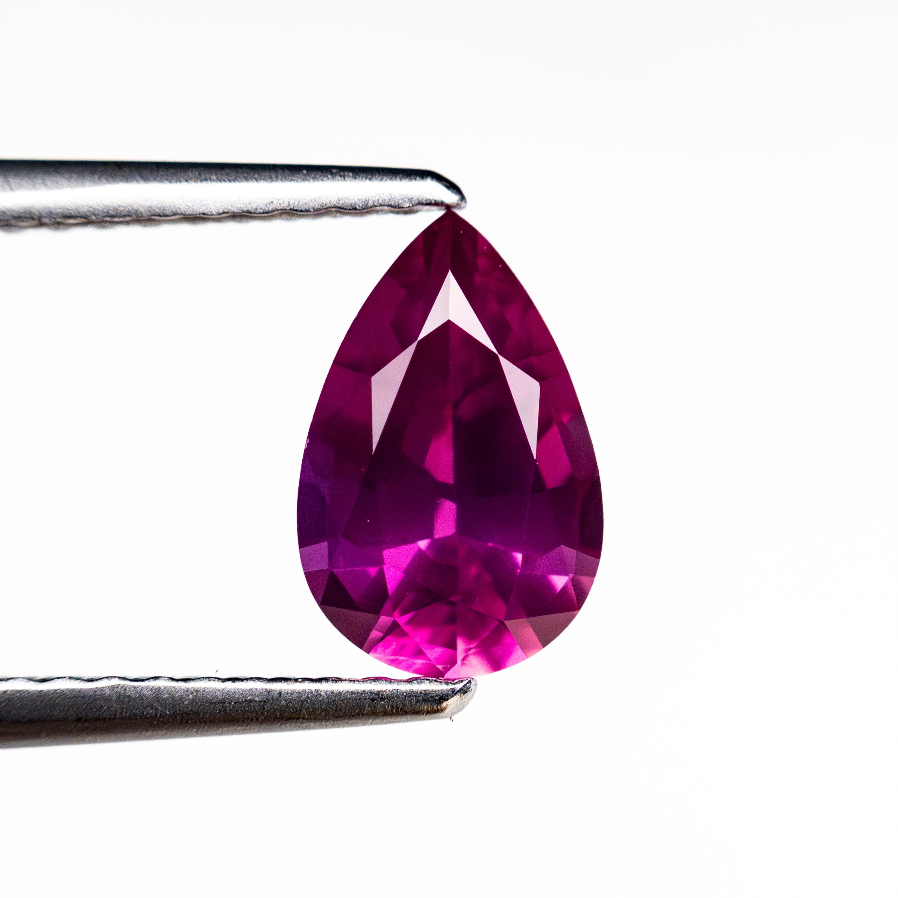 1.24ct 8.53x5.56x3.75mm Pear Brilliant Sapphire 27955 - 06 - Lelya - bespoke engagement and wedding rings made in Scotland, UK