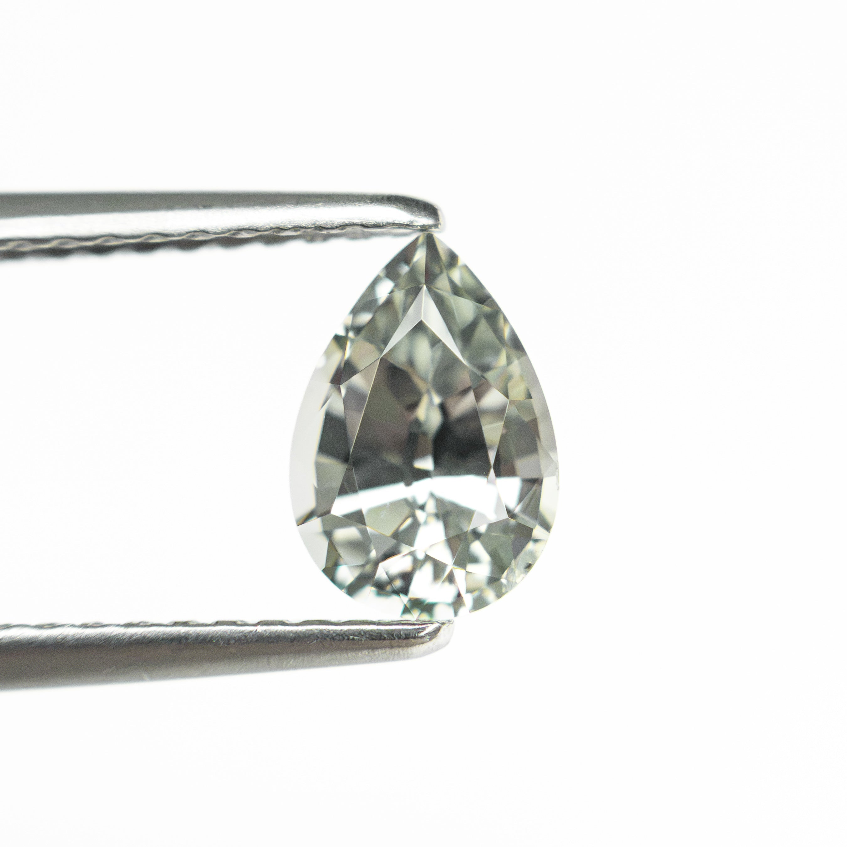 1.25ct 7.63x5.28x4.22mm Pear Brilliant Sapphire 22688-02 - Lelya - bespoke engagement and wedding rings made in Scotland, UK