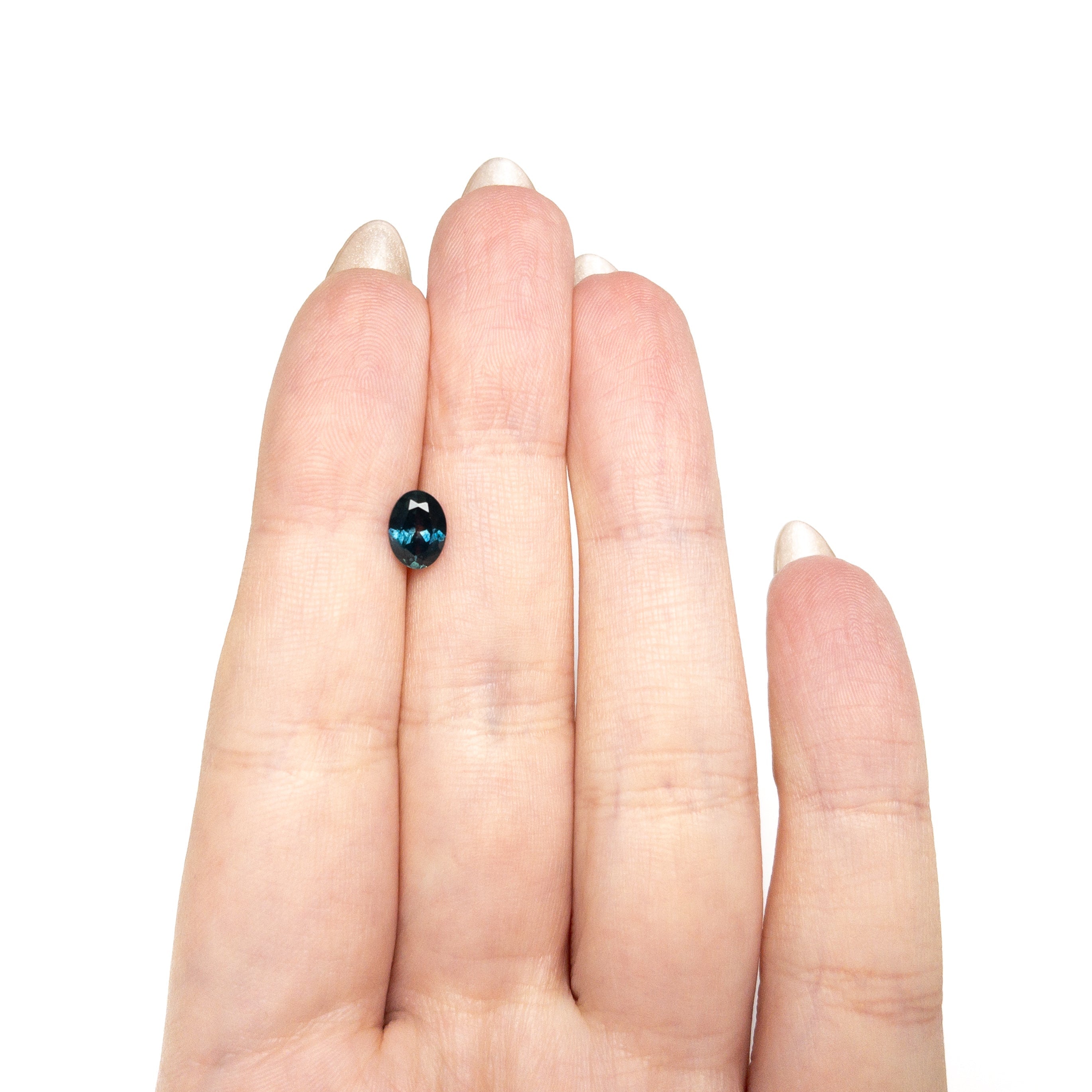 1.28ct 7.44x5.47x3.72mm Oval Brilliant Sapphire 28028-25 - Lelya - bespoke engagement and wedding rings made in Scotland, UK