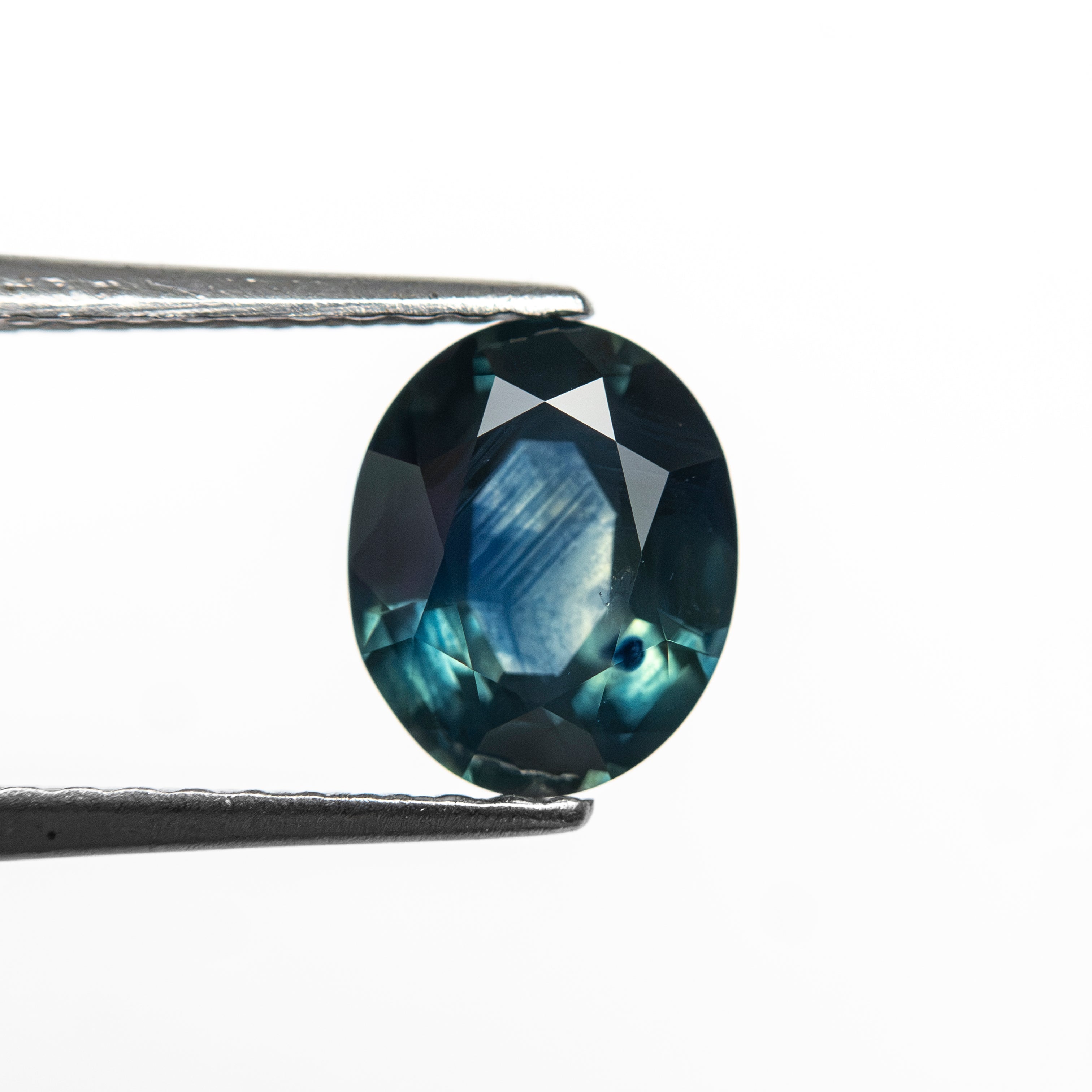 1.29ct 7.33x5.99x3.50mm Oval Brilliant Sapphire 28290-01 - Lelya - bespoke engagement and wedding rings made in Scotland, UK
