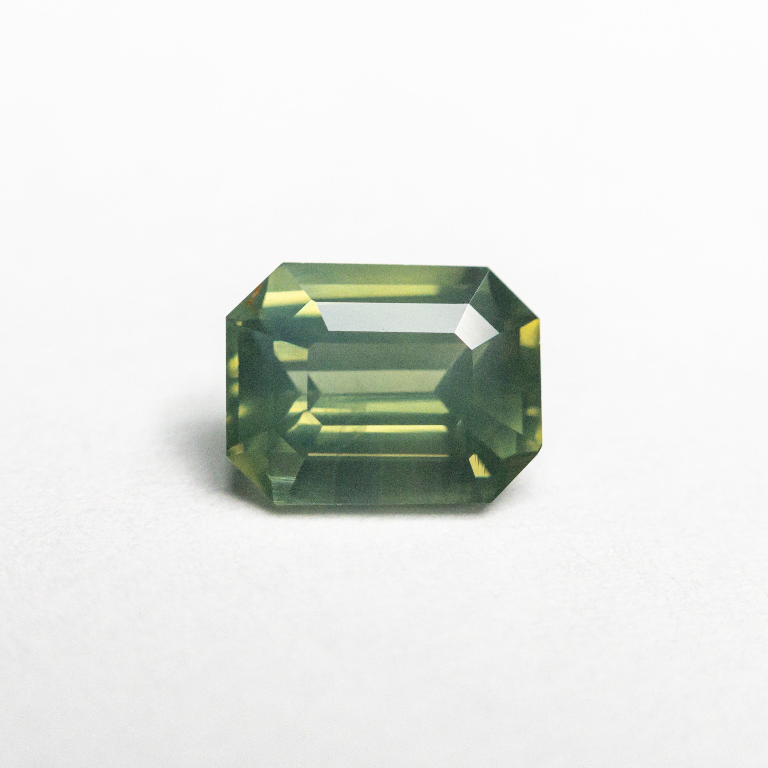 1.29ct Green Cut Corner Rectangle Step Cut Sapphire - Lelya - bespoke engagement and wedding rings made in Scotland, UK
