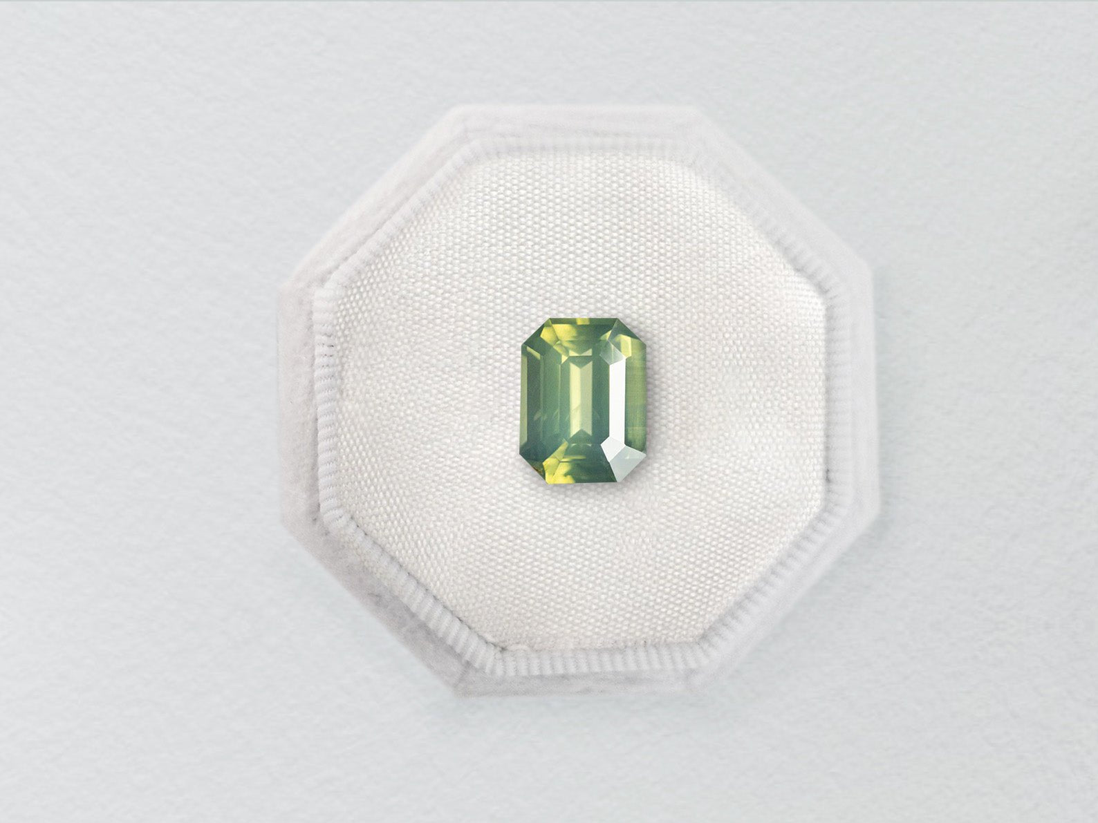 1.29ct Green Cut Corner Rectangle Step Cut Sapphire - Lelya - bespoke engagement and wedding rings made in Scotland, UK
