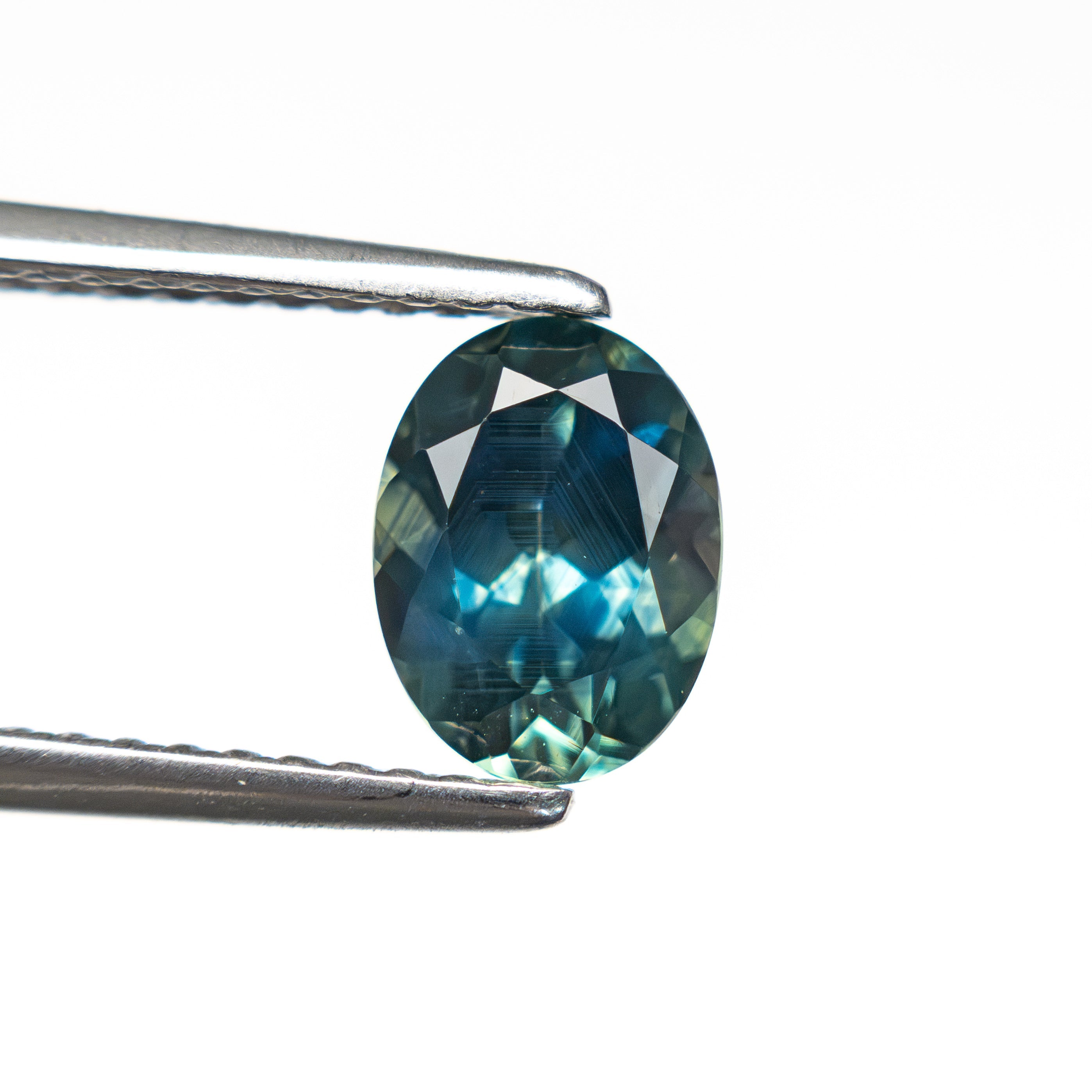 1.32ct 7.38x5.57x4.01mm Oval Brilliant Sapphire 28028-27 - Lelya - bespoke engagement and wedding rings made in Scotland, UK